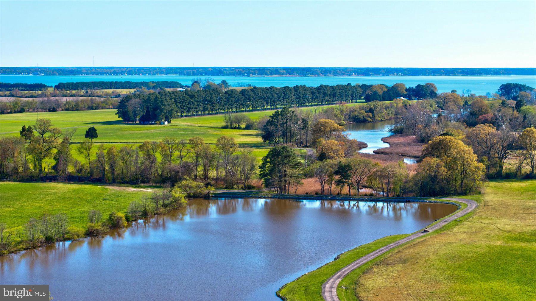 Currently one of the largest Farm/Residential Estates available in the State of Maryland and a once in a lifetime opportunity to own it. This 662+ acres waterfront property with 1.8 miles of shoreline known as "Middleville" circa 1880 is truly a magnificent landholding. Located in Talbot County the property is improved with 5 Residents. A newly renovated Main Home that boasts Tidewater Colonial mature coastal charm and expansive views of the water, 3 Guests homes, a Caretakers home and numerous storage and outbuildings. The Land itself consists of 5 parcels making up 390+/- acres of fertile cropland, 175+/- acres of mature forest, 7+ acre waterfowl holding/stocked fishpond, and 6 well fed water-controlled waterfowl impoundments. The property is improved with a pier that has two boats lifts with additional mooring and over 1200' of shoreline revetment. Enormous effort has been directed toward wildlife habitat improvement with an emphasis on waterfowl and quality game. This 'turn -key’ farm on Maryland’s Eastern Shore is a rare find and opportunity, as land is timeless and the chance to own it is not.
