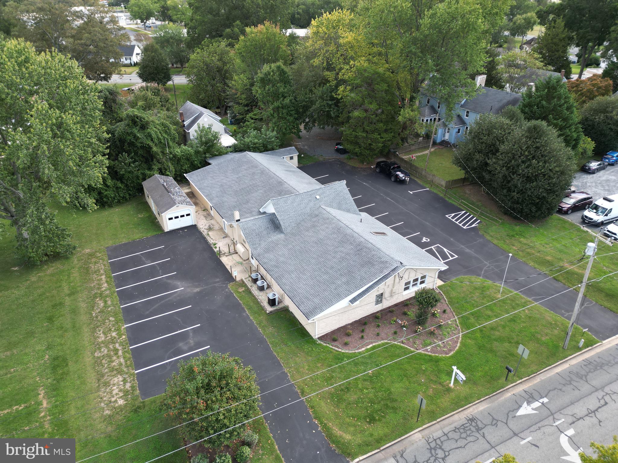 Substantial building right in the middle of all the action of Downtown Easton and the bustling Amish Market is just across the street.  This former Veterinary Clinic has a large reception area and check in area, a variety of offices, rooms and garages.  This is quite a value for what is being offered.  Owner may make some improvements if requested.