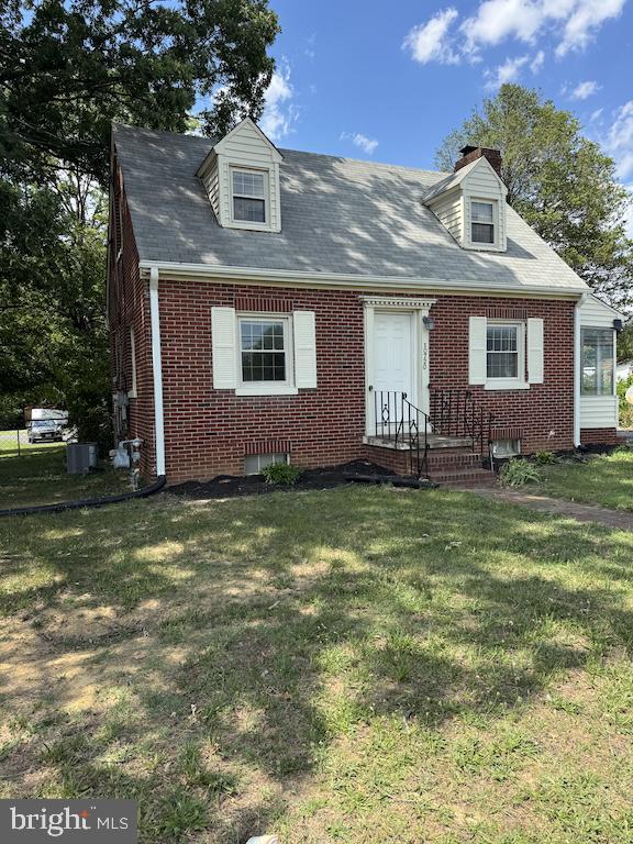 Welcome home to this quaint and timeless Brick Cape Cod that blends classic character with thoughtful updates.  As you step inside, you will be welcomed into a large living room with attractive luxury vinyl plank flooring (carried throughout the entire main level) complemented by fresh light gray paint that enhances the abundance of natural light. There’s a beautiful brick wood-burning fireplace complete with full brick mantel and hearth—perfect for relaxing evenings at home. And the curved stairs going upstairs from this room are eye-catching. Before heading upstairs though, pass through the lovely arched doorway into the Dining Room.  Bring your own ideas for use of space here as the room is central in the house.  SO many possibilities. Continuing through, you’ll find the step-saver kitchen which offers real wood cabinetry painted in a timeless shade of white, providing both character and functionality. Off of the kitchen is the entrance to the fenced back yard to the left and the stairs to the basement on the right.  Moving on to the upstairs: This is the area pictured with the full rear dormer which adds extra living space upstairs, creating two comfortable bedrooms, additional front dormers and fun room spaces. The hardwood floors upstairs are original!  They could stand a little refinishing, or simply add your favorite area rugs for an extra touch of warmth and coziness. The basement is unfinished and more like a cellar at the moment.  But it has some nice divided space that was used as den area at one point.  It's definitely an area you could make into extra finished space, a work shop, hobby area.....But wait, we can’t forget the outside! Enjoy morning coffee or unwind in the evenings on the charming covered side porch surrounded by louvered glass, or entertain family and friends on the generous rear deck.  The perfect blend of shade and sun make the the perfect spot for cooking out and visiting.  For added peace of mind, some major items have been updated in recent years to include the kitchen appliances, HVAC system, and roof.  There are also vinyl replacement windows that are in great condition but the year of replacement is unknown.  But we definitely know they aren’t original.  This property is conveniently located within minutes of I-95 and the Spotsylvania VRE station.  Restaurants, shopping, parks, community pool and medical are around the corner. And there’s some really yummy ice cream within a stone’s throw. Classic style, modern updates, and an exceptional location make this delightful Cape Cod a wonderful place to call home. It’s not perfect, but it’s the right blend of move right in and make it your own. Note: detached garage is NOT part of the property.