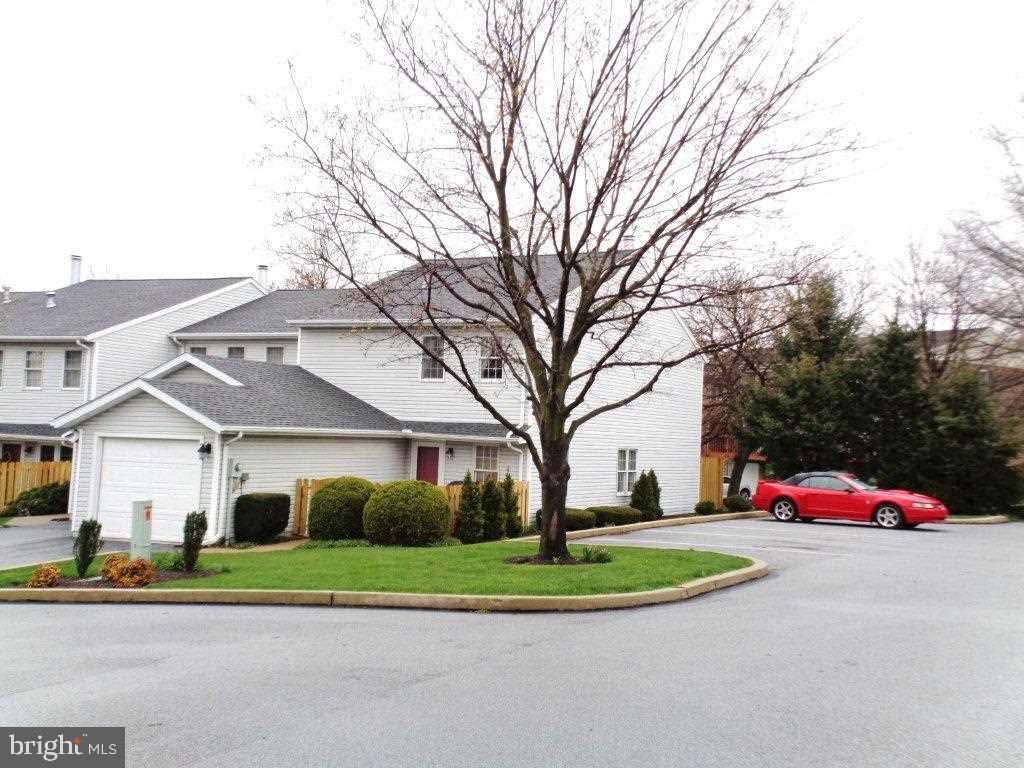 1-story living, end condo near parking, adjacent to TS Park, front & rear patios, O/S 1-car GAR, 2-year-old Trane furnace & CAC, 3-year-old Berber carpet, 3 WIC's, woodburning FP, sliding glass door to rear patio, convenient to I-83 & Rt 30.