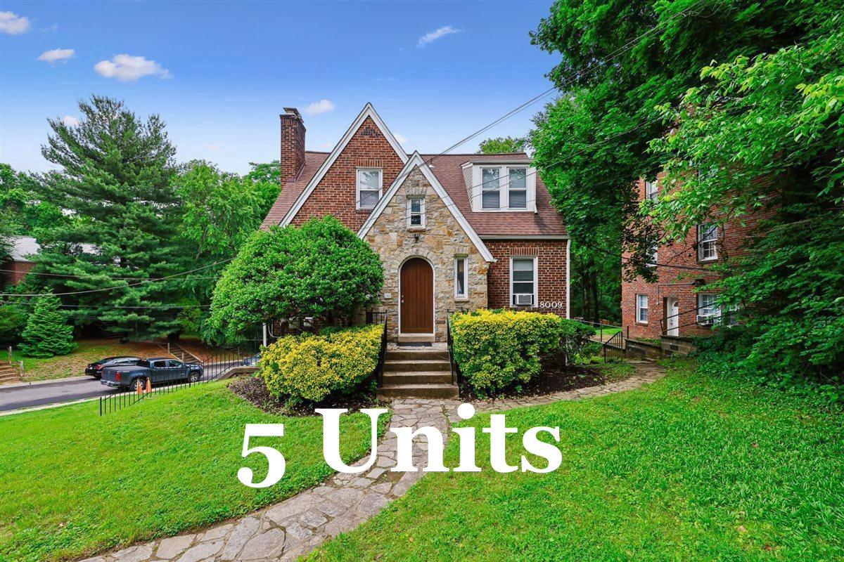Investor ALERT, this is an extraordinary opportunity to own a charming, income-producing, FIVE-unit Tudor Cottage on 8009 Garland Ave, —an architectural beauty that blends the compact symmetrical layout of a Cape Cod with the picturesque elements of a Tudor Revival. Offering approximately 2,300 sq ft of living space on a generous 7,836 sq ft corner lot backing to Long Branch Park. Just a stroll to scenic amenities; enjoy the playgrounds, sport courts, picnic areas, and extensive trails. This fully occupied property features several apartment styles. (1) Two-bedroom with sunroom or 3rd bedroom apartment, along with a delightful fireplace facade. (1) one bedroom with sunroom or 2nd bedroom apartment. (3) one bedrooms, with one additional fireplace facade. Each is separately metered (5) for electricity. Recent updates include: roof, wall paint, new carpeting, and a gorgeous custom arched entry door. Managed by owners who have lovingly maintained the property and do appliance updates as units turn. Includes public water/ sewer, gas heat, and a basement laundry facility with bike storage, this property is designed for a low-maintenance and long-term portfolio. Unlike many nearby properties, this structure is not subject to Takoma Park city proper rent restrictions. That delivers an endless opportunity to build wealth with appreciation, income growth, and stability. Experience strong rental income and take advantage of valuable tax incentives. Your tenants will love the tranquil, tree-lined street, ample corner parking, and the convenient proximity to shopping, restaurants, Metro, Washington Adventist University, and downtown Takoma Park, making this a sought-after location that will always remain in high demand. Don't miss this turnkey multifamily investment with immediate income and long-term appreciation, ideally located in one of Montgomery County’s most coveted rental destinations. Or Live in one unit and let the other 4 serve as income. You can't go wrong with this exceptional property. Current leases must be honored. Showing of this property is extremely limited please contact your real estate professional.