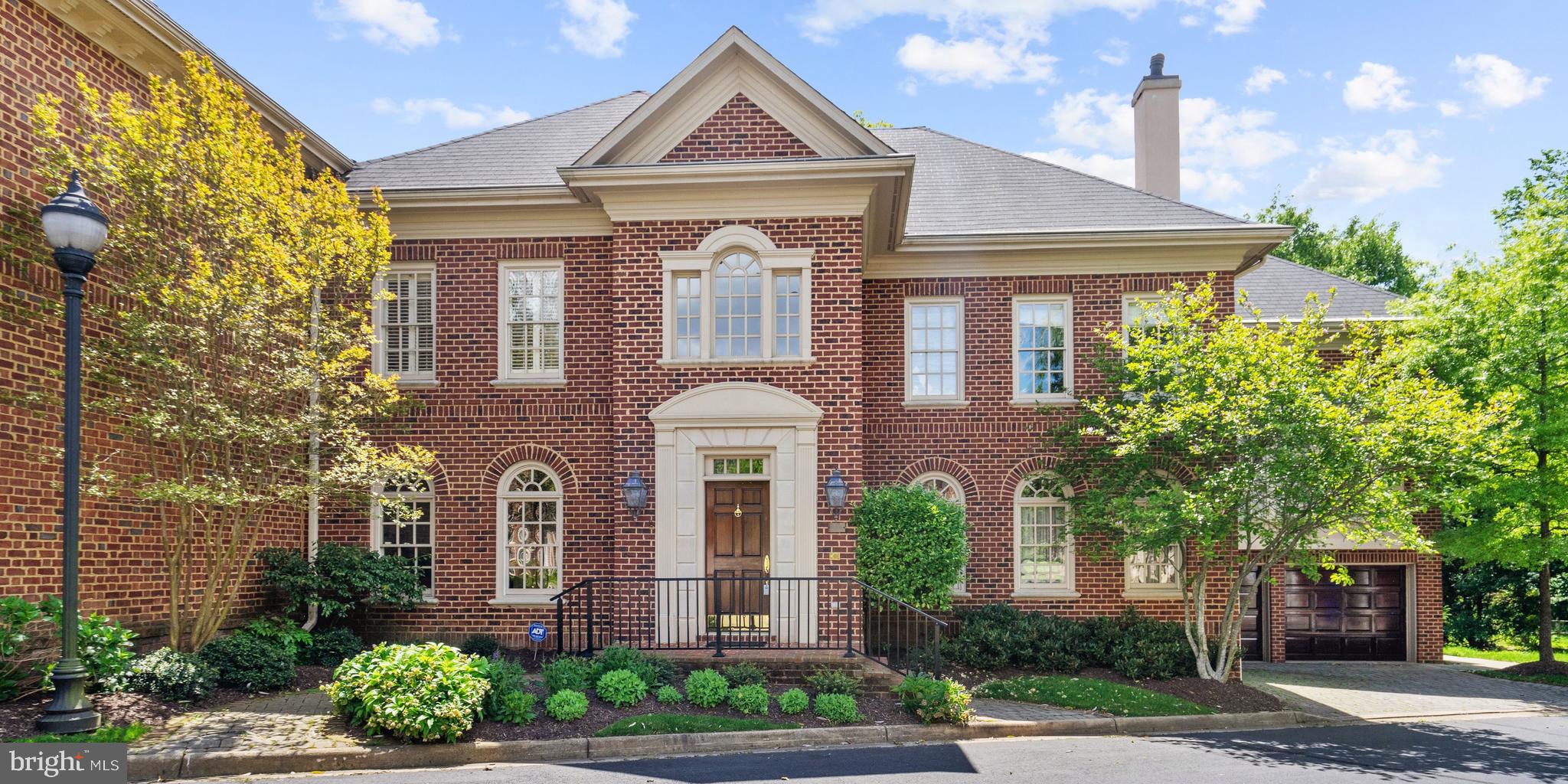 ***Solid value for over 5,000 square feet of well designed space on a 5,300 square foot with space for gardening, play, grilling, and relaxing.  Tucked away at the end of quiet cul-de-sac, this Chain Bridge Terrace brick,  end townhouse  lives like a single family home for those who value privacy and serene views.***An elevator extends to all levels of the light filled home for comfort and accessibility.** The two story foyer is flanked by a traditional living room with gas fireplace and dining room open to butler's pantry with double wine fridges.***The kitchen, breakfast room, and family room span the back of the home and offer open views of the neighborhood.   A Viking gas range, paneled SubZero refrigerator, and Bosch dishwasher will appeal to cooks of every caliber.  Ample cabinets, granite and stone countertops, a pantry cupboard and planning desk are desirable details.  Handsome ceramic tile extends from the kitchen into the breakfast area, providing large windows and plantation shutters. * **The adjoining family room is a delight with built-in media cabinets flanking the gas fireplace, and French doors opening to the deck.  Wood floors extend from the living, dining room, and foyer into this room as well.**  A powder room, coat closet, and entry to the two car garage complete this level.  ** A half level  up is the large second bedroom with triple windows at the front, private bathroom with walk in closet and double closets in the bedroom.** Upstairs, the large master bedroom opens to a sitting room or office with built-ins at the gas fireplace and double doors opening to the bedroom for privacy.*** In the  master bathroom, there is a soaking tub, oversized shower, large vanity with separate make up spot, and a coffee bar.  A second washer and dryer are located in the big, organized master bedroom closet.*** The second bedroom has wood floors, and en suite bathroom, and double closet.**On the top floor, the fourth bedroom features dormered ceilings and built in cabinets for alternate use as an office.  A private bathroom has a vanity and large shower.***** Light streams into the lower level through French doors opening directly to the expansive patio.  A  kitchenette offers microwave, undercounter fridge, and dishwasher for entertaining or use by an in law.***  The 5th bedroom on this level has double windows, and a big walk in closet with organizer off  its en suite bathroom. *** A versatile room on this level may be used for a gym, hobbies or media while a big storage room has built-in shelving. ***The second washer and dryer are in the laundry room with utility sink and storage.  A pretty powder room completes this level.*** Outside the private patio features a hot tub, grill, several seating areas, and a burbling fountain.   Planting areas surround the patio and with mature shrubbery and perennials. The fenced yard is ideal for children and pets.***Storage cabinets line the oversized two car garage with two additional spaces in the driveway.*** Located  less than a block to Fort Ethan Allen Park and near the Madison Community Center with many amenities, including a dog park.*** Comfortable commute to Washington via nearby Chain Bridge or to Tyson's by way of Route 123.  Easy access to Rosslyn-Ballston Business Corridor, Fort Myer/Joint Base Henderson, Foreign Service Institute, Pentagon,  Crystal and Pentagon Cities aka National Landing.******A home of enduring quality and character in an enviable location.***