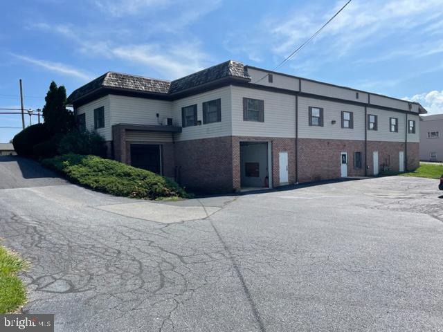 Former construction office, showroom, shop and storage space.  Suite features one 8x8 loading dock and one 10x10 drive in door.  Gross rental rate includes all operating expenses and tenant is responsible for utility costs.  Property is presently vacant and available.