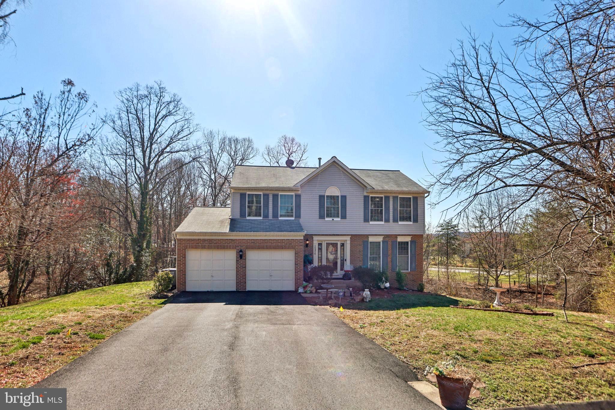 Welcome to this spacious 4-bedroom, 3.5-bath single-family home, located on a peaceful cul-de-sac and offered As-Is, presenting a great opportunity for customization. The home features beautiful hardwood flooring on the main and upper levels, two welcoming family rooms, including one with an unused gas fireplace. The open-concept kitchen with an island flows into formal living and dining areas, and there’s a convenient half bath. Upstairs, the primary suite includes an en-suite bath and a generous walk-in closet, while three additional bedrooms share a full hall bathroom.

The fully finished basement, with its own separate entrance, provides additional living space with a large recreation area, a den or bonus room (ideal for an office or guest room), a wet bar, and an extra refrigerator—perfect for entertaining. Outside, enjoy the private deck with jacuzzi access. Additional highlights include an automatic sprinkler system, a charming sunroom opening to a second deck, a two-car garage, and a driveway with space for six cars.

While the home could use some TLC, including cosmetic updates and minor repairs, it offers incredible potential in a desirable location, near major routes, shopping, and dining. Don’t miss this opportunity—schedule your private tour today!