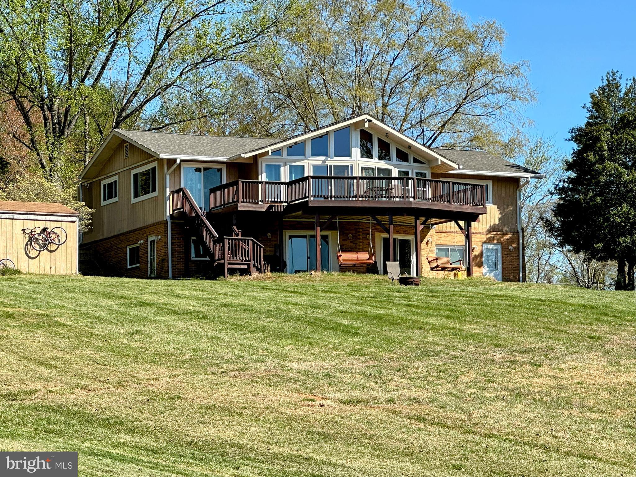 Available for Lease starting February 2nd. You'll find an expansive open area of land to include access to the lake on the property. Be the first schedule before it's too late! The upper floor of this 2-level home is the area that is offered consisting of 3 bedrooms, 1 full, and 1 half bathroom. The lower level is tenant-occupied. The laundry is not shared, each unit has its own clothes washer and dryer.