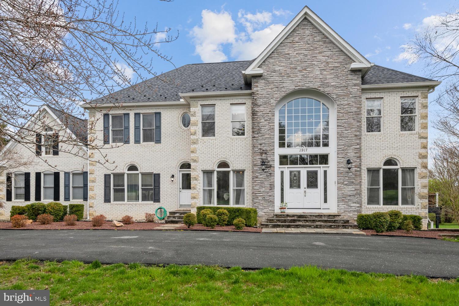 Nestled on a quiet cul-de-sac, this expansive colonial home boasts over 7,000sq/ft sitting on over 3 acres. This home has been meticulously renovated by the current home owners. The beautiful open kitchen was renovated to feature white kitchen cabinetry with a contrasting kitchen island, granite counter tops, tile backsplash, Thermador stainless-steel appliances with gas cooking, large pantry, and breakfast area with wall to wall windows overlooking the new trex composite deck and backyard. This main level also features a formal dining room, a large living room with two-story ceiling and fireplace,  a second living room at the front of the home, a home office with custom built-ins, one bedroom, and one full bathroom. All the hardwood flooring on the main level was just refinished in Mach of 2024. Head upstairs to your enormous primary suite with balcony, and a newly renovated ensuite bathroom featuring two vanities, large shower, and soaking tub. The primary suite also has newly installed premium racks and shelving in the large walk-in closet. Down the hall you have three additional bedrooms and two more bathrooms which each have been recently renovated as well. One of the bedrooms has an ensuite bathroom, and the third and fourth bedrooms share a jack and jill style bathroom. All three of these bedrooms have at least one walk-in closet each. The walk-out lower level is a 2,288 square foot blank canvas with one full bathroom for the new owners to customize to their liking. All mechanical systems were replaced in May of 2022. The entire roof was replaced in 2018.