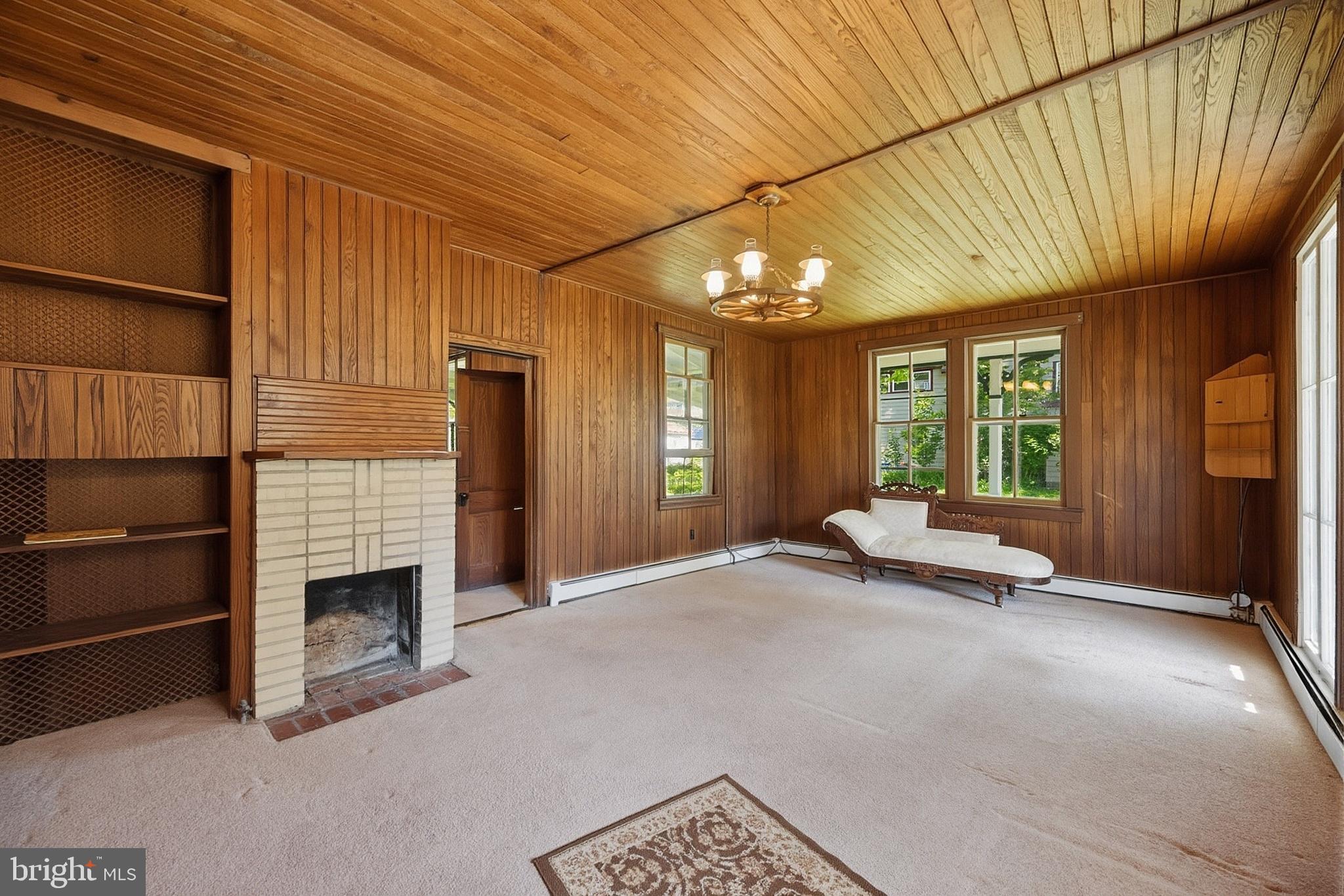 Step back in time with this charming 1900 home located in the heart of historic Mountain Lake Park. Offering 4 bedrooms, 1 bath, and 1,432 square feet, this property sits on two lots totaling 0.27 acres and is ready for its next chapter. Rich in character, the home features original woodwork, hardwood floors beneath the carpet, two fireplaces, spacious rooms, and a wraparound covered porch perfect for relaxing and enjoying the neighborhood. Public water and sewer, a metal roof, and a storage shed add to the appeal. Enjoy the convenience of a playground just at the end of the street, along with easy access to downtown Oakland, Broadford Lake/Park, Deep Creek Lake, and Wisp Resort. This property presents a rare opportunity to restore and personalize a piece of Garrett County history. Call today for your personalized tour!
