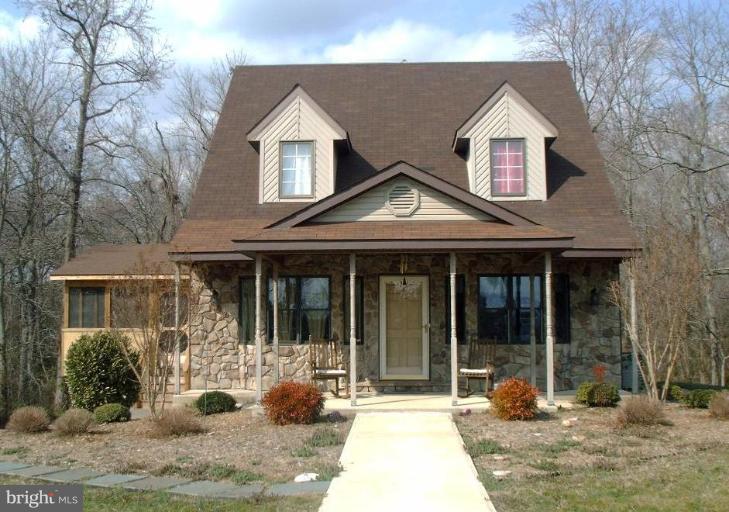 Bank approved priced & 3%closing help! 3 bedroom 3 bath charming home on over 3 acres!  Easy commute to bases! wood beams on the ceiling in kitchen and living room, stainless steel appliances, basement work room, vaulted ceilings on bedroom level, HUGE trex deck screened in, brand new carpet, new flooring in kitchen, newer dual HVAC units, beautiful circular driveway, deer and wild turkeys abound!