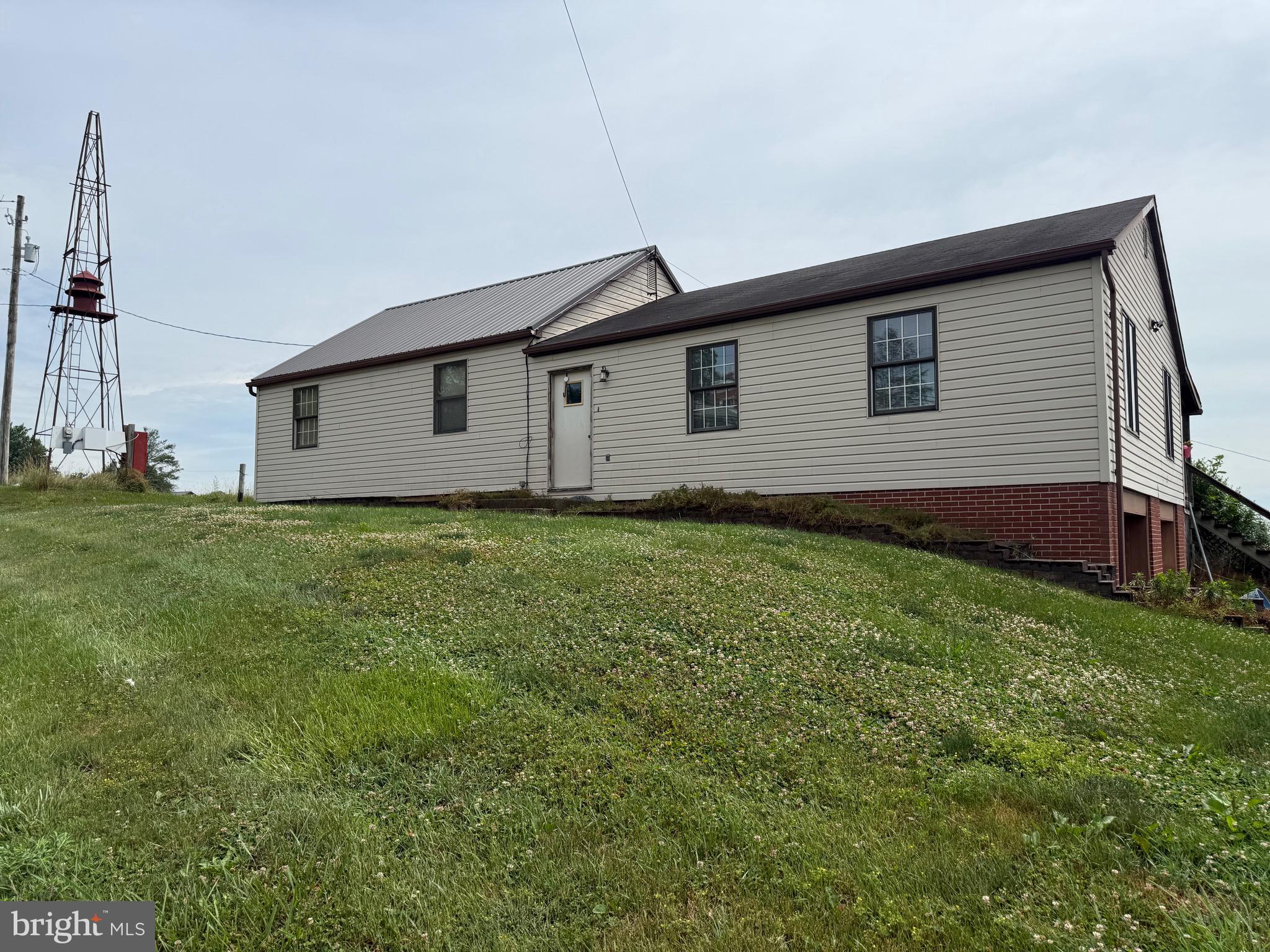 Opportunity awaits with this 3-bedroom, 1-bath home on approximately 1.37 acres. The property includes the home on a 0.37-acre parcel plus an additional adjoining 1-acre lot (Tax ID: 280-15588-0-0000), which has expansion potential or future investment opportunities. The home is zoned Village Commercial, no other dwelling can be built, but a commercial building/barn/garage could be built pending township approval. 

The home features a two-car attached garage with additional storage spaces.  The home is ready for updates and your personal touch. Whether you're looking for a primary residence, renovation project, or investment property, this offering provides endless possibilities in a desirable setting. 

Both parcels are included in the sale for $400,000. Don't miss this unique chance to own over an acre of land with room to grow!