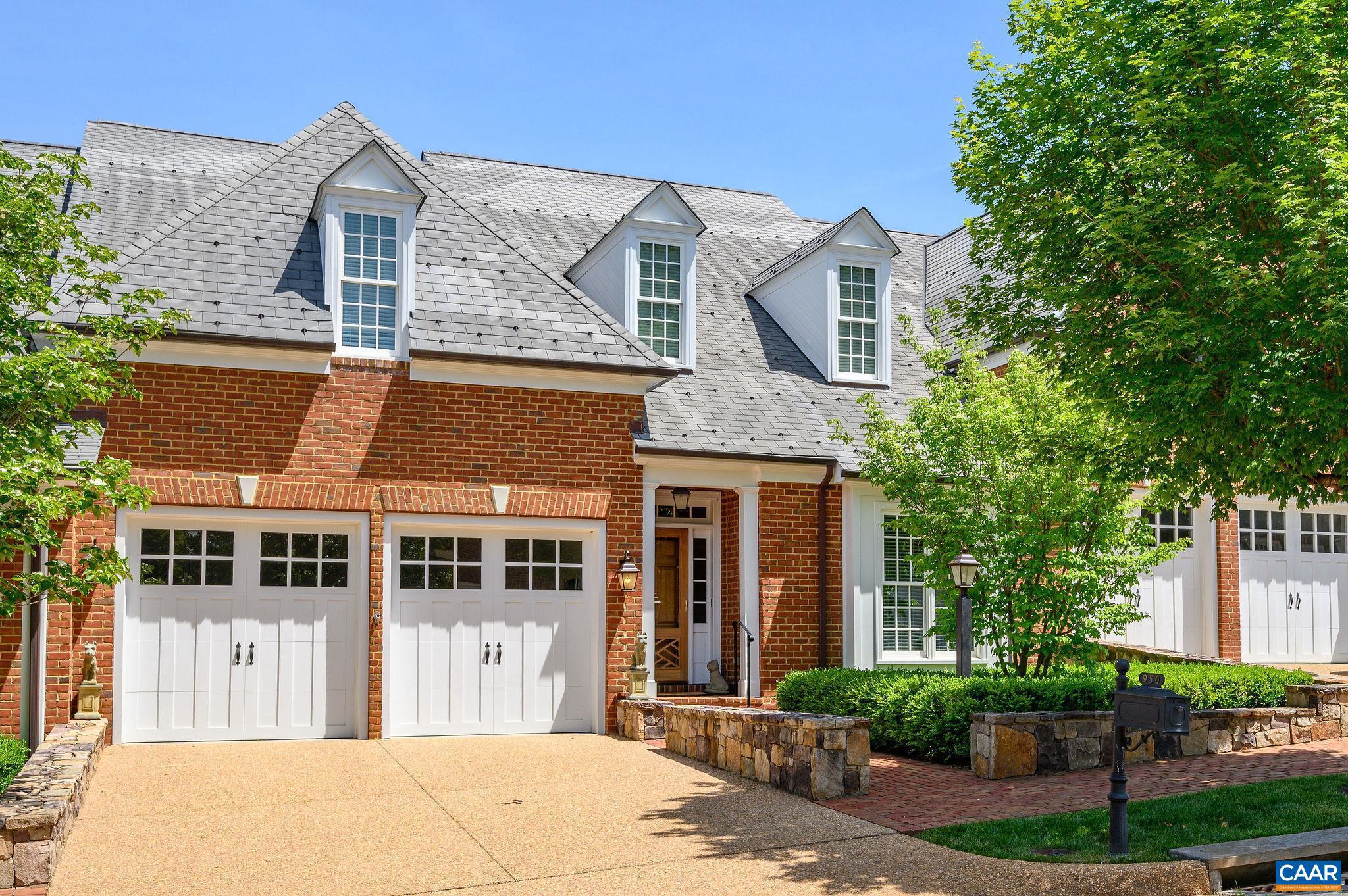 Enjoy easy one-level living in the highly sought-after Kenridge neighborhood. Thoughtfully designed for both everyday comfort and elegant entertaining, the expansive Great Room showcases soaring 10-foot ceilings, dramatic floor-to-ceiling windows, and a fireplace, seamlessly connecting to the dining area, kitchen, and outdoor deck. A private study with custom built-ins offers an ideal work-from-home environment. The main level features a spacious ensuite primary suite with tranquil views, as well as a separate ensuite guest bedroom, providing exceptional convenience and privacy. A powder room and laundry room further enhance the ease of main-level living. The upper level includes an additional bedroom, full bath, cedar closet, and substantial storage space. The finished terrace level offers remarkable versatility, featuring a generous recreation area, fourth bedroom and full bath, second fireplace, bar/kitchenette, dedicated exercise room, and extensive storage. Additional amenities include a two-car garage and HOA services covering landscaping, trash and recycling collection, and snow removal. Ideally situated just minutes from the University of Virginia, golf, shopping, dining, and downtown Charlottesville.,Granite Counter,Wood Cabinets,Fireplace in Family Room,Fireplace in Great Room