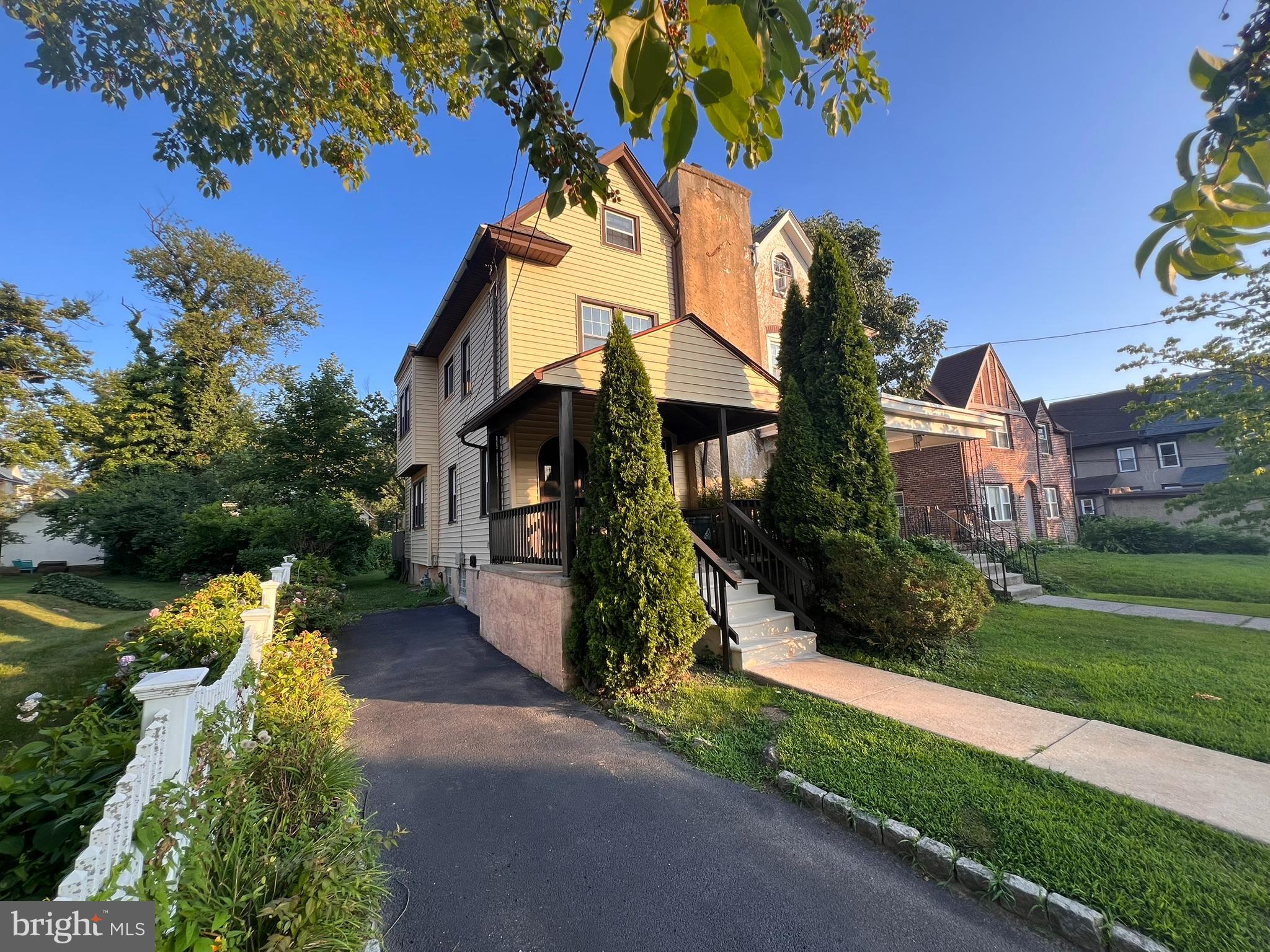 Welcome to 52 W. Albemarle Avenue in Lansdowne Borough. This spacious twin home offers four bedrooms and one full bath, featuring hardwood floors throughout. The main level includes a living room with a fireplace, a formal dining room, and an updated kitchen with a dishwasher and built-in microwave. The second floor offers three bedrooms and a full bath, while the third floor provides a fourth bedroom along with a cedar closet for additional storage. Relax on the inviting front porch or enjoy the rear deck overlooking the backyard. A standout feature is the private driveway with off-street parking—a rare convenience in this neighborhood where many homes have shared driveways. Conveniently located near Lansdowne's shops, restaurants, parks, public transportation, the regional rail line, and the restored Lansdowne Theater, this home offers a great combination of space, character, and everyday convenience.