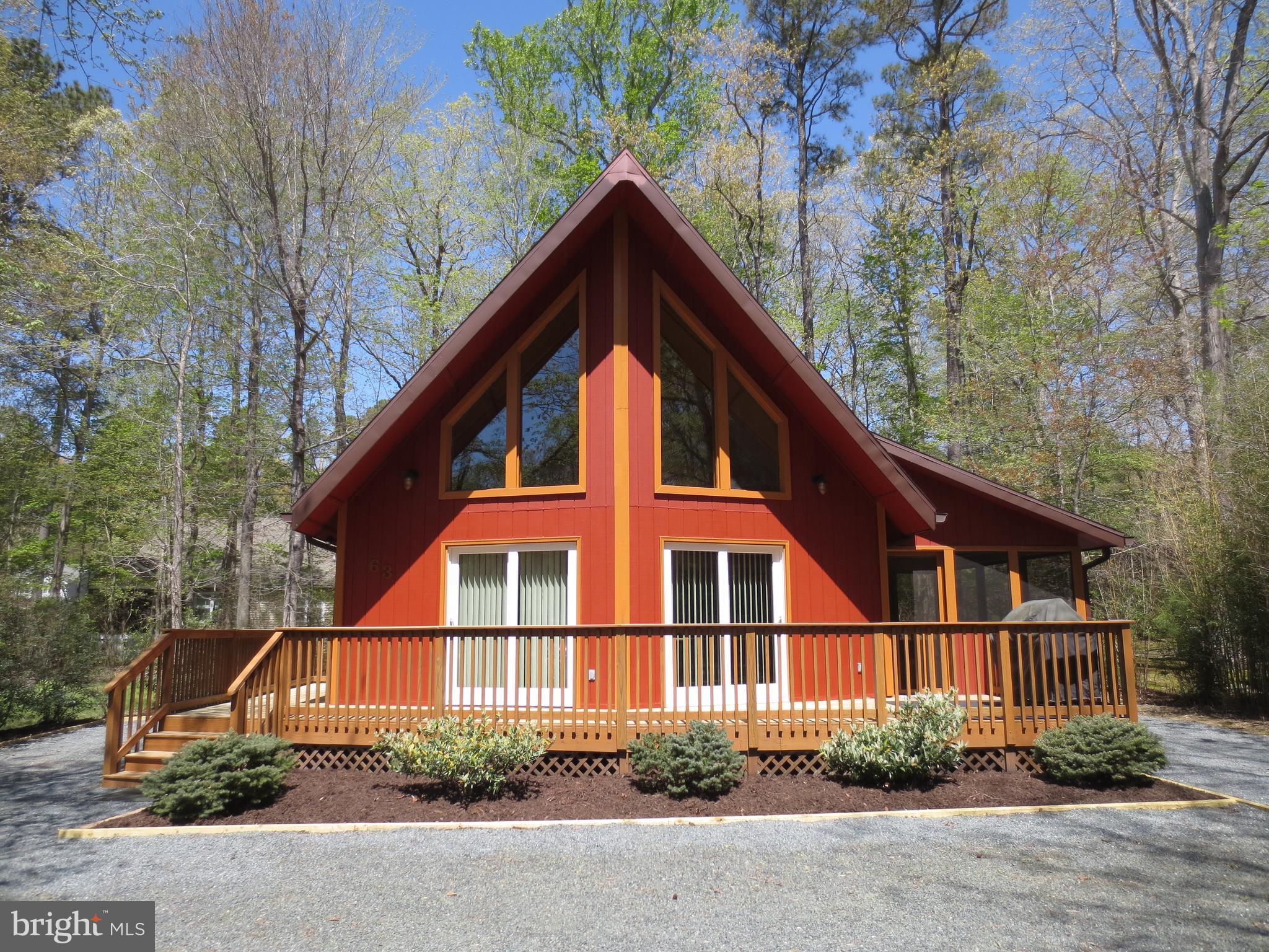 Beautiful 3 BR 2 BA fully furnished turn key A frame total rehab home in 2012. Lightly used vacation property which features new appliances, kitchen cabinets, int/ext paint, doors, windows, laminate floors, carpet, bathrooms, plumbing, electric and panel, front load w/d,  50 yr shingle roof, encapsulated crawl space w/dehumid, HWH, trane HVAC, gutters, & deck. Actual sq ft higher than tax record.
