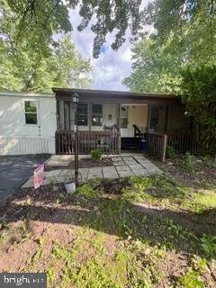 Great opportunity in Newberry Estates.  Spacious double wide with potential for the right buyer willing to put in some elbow grease and make it their own.  Ideal for investors or buyers seeking affordable living.  Conveniently located.  Property being sold "as is" and requires updates and repair.  Roof, heating system and hot water heater recently updated.  The possibilities are endless.