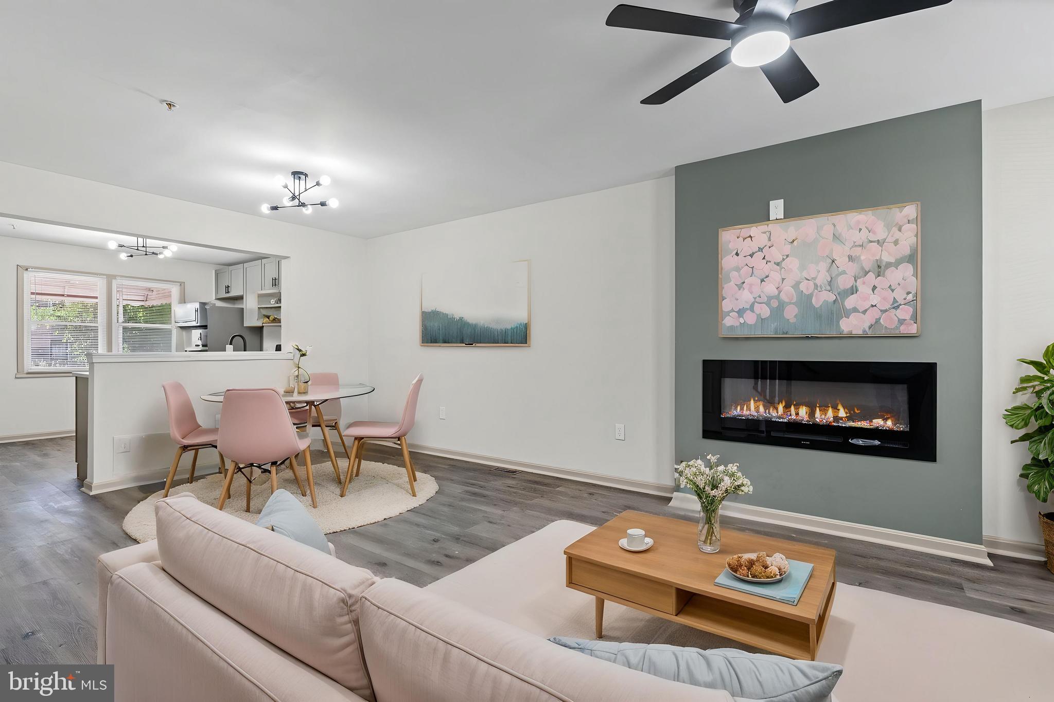 Fully renovated in 2022, this stunning three-level brick-front home perfectly blends modern luxury with everyday functionality. Featuring 3 spacious bedrooms, 3 full bathrooms, central A/C, dedicated parking, and a residential sprinkler system, this turnkey property is completely move-in ready.

Step inside to an inviting open-concept layout highlighted by designer lighting, luxury vinyl plank flooring, fresh paint, custom accent doors, and a striking electric fireplace with a built-in TV feature wall that creates the perfect focal point for relaxing or entertaining.

The chef-inspired kitchen is designed to impress with granite countertops, stainless steel appliances, a 5-burner range, over-the-range microwave, abundant cabinetry, and generous prep space—ideal for everyday living and hosting family and friends.

The fully finished lower level offers exceptional flexibility with a full bathroom, making it the perfect space for a family room, home office, gym, media room, or guest suite. Step outside to your private fenced backyard with a spacious deck, providing the perfect setting for summer cookouts, entertaining, pets, or simply unwinding after a long day.

Built in 1998, this home offers the advantages of newer construction while showcasing the stylish updates today's buyers are looking for.

Location is everything! Just minutes from Druid Hill Park, currently undergoing a $50+ million transformation, you'll enjoy easy access to playgrounds, tennis courts, basketball courts, sports fields, walking and biking trails, the Howard Peters Rawlings Conservatory, the Maryland Zoo, disc golf, picnic areas, and countless outdoor amenities.

Commuters will love being less than 2 miles from Penn Station, under 3 miles from M&T Bank Stadium and Oriole Park at Camden Yards, and only a 10-minute drive to Downtown Baltimore and the Inner Harbor, where you'll find the National Aquarium, Maryland Science Center, waterfront dining, shopping, and entertainment.

If you've been searching for a move-in ready, fully renovated home with modern finishes, generous living space, outdoor entertaining areas, and an unbeatable location, this is one you won't want to miss.

Schedule your private showing today before it's gone!