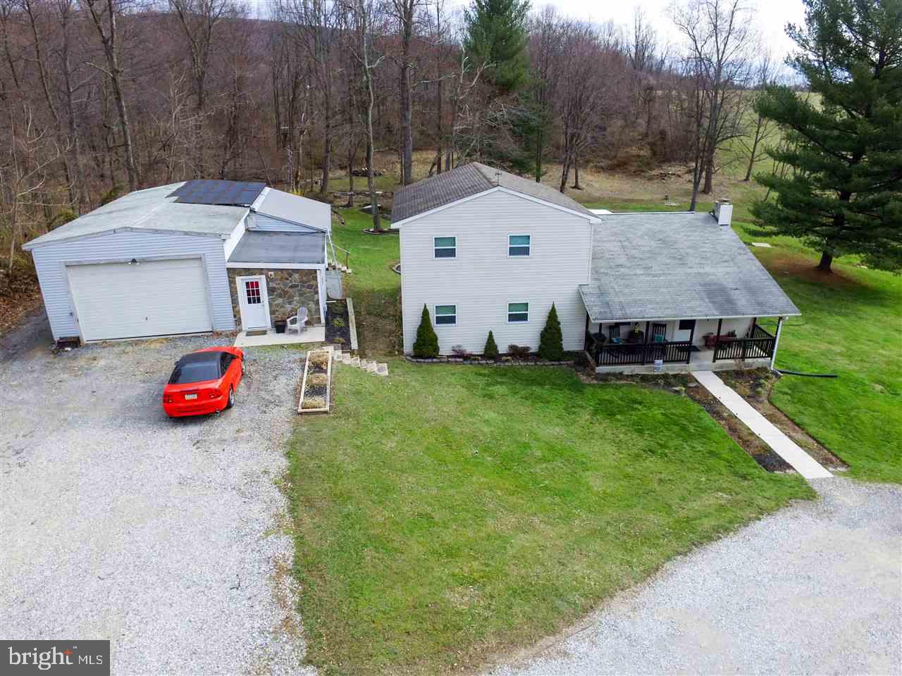 Want to hunt and fish in your own back yard? This home features 4 bdrs and 3 full bths. Spacious open area incl. living rm, dining area, and kitchen. 1st flr also has a den, 3 bdrs and 2 full bth. 2nd flr has mstr suite which has a marvelous wlk in closet, spacious full bth and access to the fascinating balcony w/ incredible views of the pond. Outside is a massive detached garage. Along with the balcony there is a covered dck and covered porch perfect for watching the wildlife on this phenomenal property.