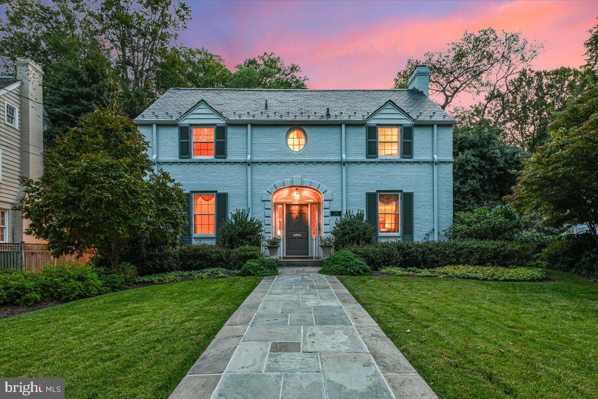 Welcome to 7106 Meadow Lane, ideally located on one of the most beautiful streets in Chevy Chase Section 4. This home offers easy access to two schools, downtown Bethesda's shops and dining, and the Metro. As you approach this elegant center hall colonial, you are welcomed by an impressive stone walkway, a manicured lawn, and beautiful gardens leading to a covered front porch alcove featuring an arched transom window.

Upon entering the gracious foyer, you'll experience a warm and inviting atmosphere filled with natural light. To the left, there is a spacious office complete with built-in shelves, alongside a conveniently located powder room. On the opposite side of the staircase, you'll find a gracious formal living room with a fireplace, spacious enough to accommodate a grand piano. The ceilings on this floor are nearly 9 feet high, contributing to the home's airy feel.

Next, the generously sized family room addition features another fireplace, a wall of built-in shelves, and windows that provide views of the blooming gardens and terrace in the backyard. Following this, you'll enter a banquet-sized dining room that leads into a stunning gourmet kitchen designed by Jennifer Gilmer. This kitchen boasts a butler's pantry/bar area equipped with an icemaker, a walk-in pantry, dual sinks, dual dishwashers, a 6-burner Thermador gas range, a SubZero refrigerator, beautiful cabinetry, stone countertops, and glass-front display cabinets. A sunny breakfast area complements the kitchen, providing access to the two-car garage and the fenced backyard, which features lush, inviting gardens—creating a tranquil setting for gatherings or al fresco dining.

On the upper level, you will find three spacious bedrooms and two renovated bathrooms, including the owner's bath, which features heated floors and spa-like finishes. There is also a pull-down attic that offers additional storage space. Throughout the house, hardwood floors are present beneath the carpet.

The unfinished lower level includes a full bathroom, a laundry area, and a side entrance to the driveway—it is ready for your final touches to transform it into a recreational space, gym, or craft area. The home boasts several upgrades, including a new slate roof, repointed stone walkways and terraces, expansions to the kitchen and family room, a 3-zone HVAC system, and lawn sprinklers to keep the gardens lush. Additionally, there is a detached two-car garage—just a few of the fine details that make this home immaculate.

Showings for agents and their clients begin on Friday, October 3rd, at 5 PM. All other showings are by appointment only.
