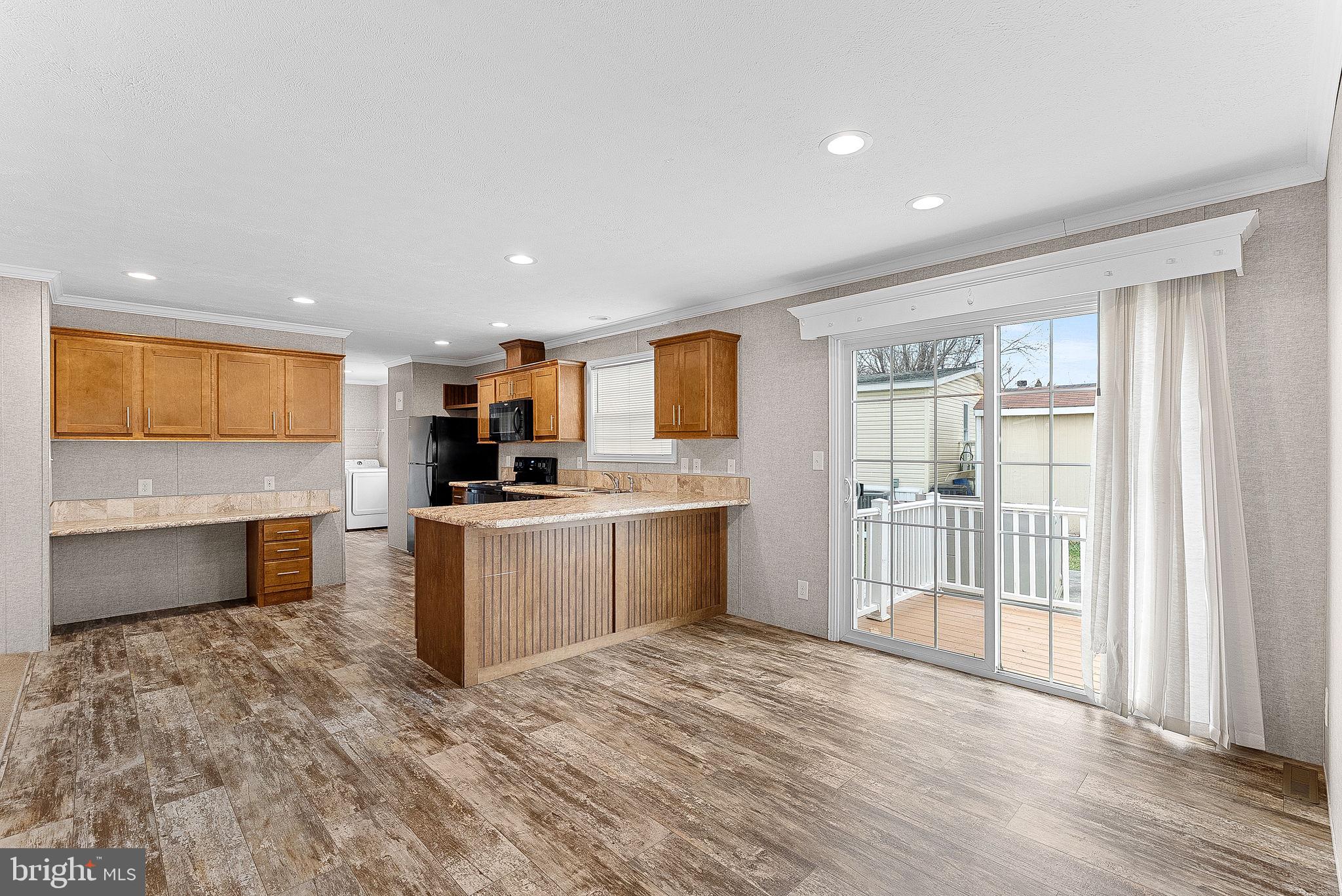 This 2018-built manufactured ranch-style home is move-in ready and well maintained for its new owner. The home offers an open floor plan featuring a spacious kitchen with abundant countertop space, a large pantry, and a dining area that flows into the main living space. The living room provides plenty of open space for comfortable everyday living, and the home also includes a dedicated laundry room.

All three bedrooms are generously sized, including a primary bedroom with a private ensuite bathroom. The two secondary bedrooms share a hallway bathroom and offer ample space for family, guests, or a home office. Just off the kitchen and dining area is a deck, providing a great space for outdoor relaxation.

The property is located in the Regency Lakes community, conveniently situated near Route 7 with easy access to I-81. Regency Lakes offers a variety of amenities including a community pool, fishing, tennis and basketball courts, tot lots and playgrounds, a fitness center, clubhouse, and more.

Please note this is a personal property sale, and Regency Lakes requires an application for residency within the community. The land is subject to a ground lease.

Lot rent is currently $953 per month (purchaser to perform their own due diligence). Community requirements include a criminal background check and a minimum 650 credit score. Each home receives two parking permits, with additional overflow parking available.

Please contact the listing agent or co-listing agent with any questions.