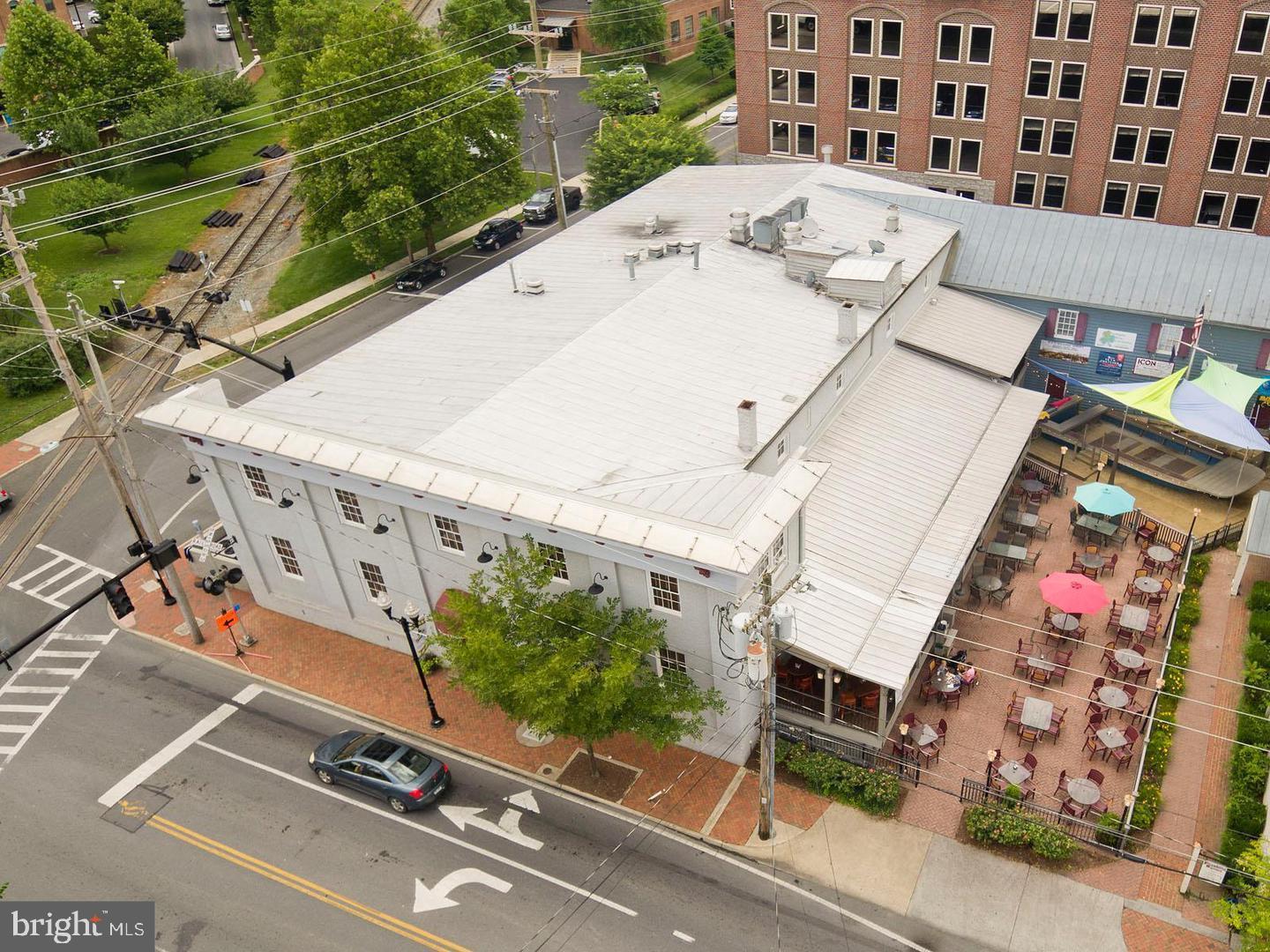 Here is the opportunity to own a piece of history! The hottest spot in Winchester/Frederick County. The 20,386+/- SF building started out as a furniture warehouse that served the area for many years. In 2005 it was converted to a Restaurant that is now the most popular dining and entertainment destination in the area. In addition to the famous “pub” area, the restaurant includes a more formal dining area with a piano bar, tons of outdoor seating, Banquet and events area on upper level, outdoor covered desk/bar and the most popular feature, “The Jam Rock Boat.”  That’s right, an actual boat was hauled in and permanently installed to provide an area for bands to use as a stage. This is a major draw on Friday and Saturday nights when the best local bands entertain the crowds. Just steps from the Old Town Walking Mall and adjacent to the historic Wyndham/George Washington Hotel. Well-established turn-key business that includes all fixtures, equipment, and real estate.  Owner wants to retire but will assist with transition after purchase. Seasoned, well-trained managers and staff will stay. Winchester is seeing incredible growth. This is an opportunity to ride the expansion which will be seen in the coming years.  CPA prepared financials available to qualified buyers. Non-disclosure Agreement required.  Owner financing available with acceptable down payment.