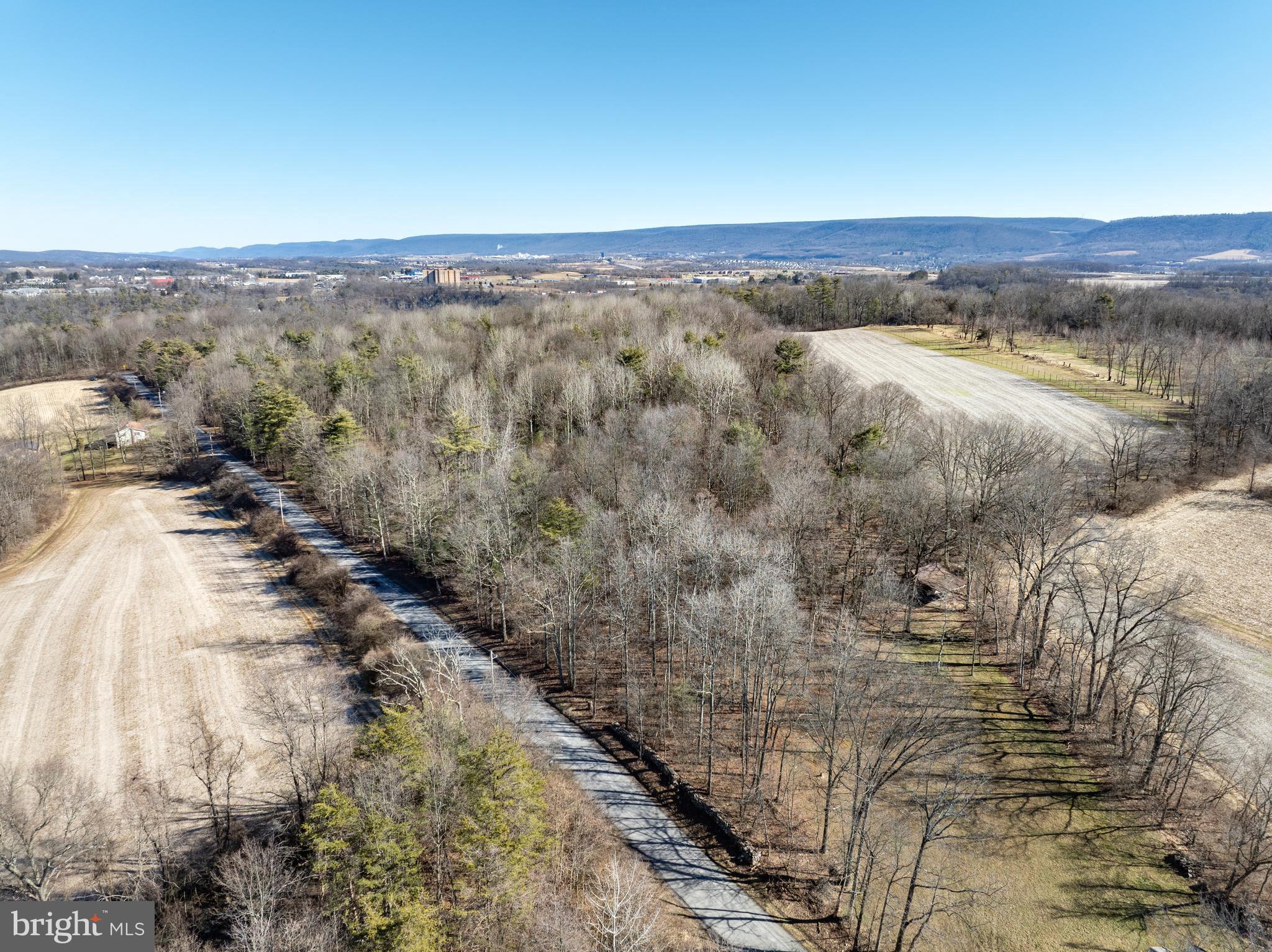 Your dream home awaits! This fantastic 2.87-acre wooded lot offers seclusion and privacy surrounded by farms and state game lands while offering easy access to schools, restaurants, shopping centers, State College Regional Airport and Beaver Stadium. The lot has electric to the property and has been perc tested and approved. There are additional lots available upon request. Don't miss out on this wonderful opportunity!