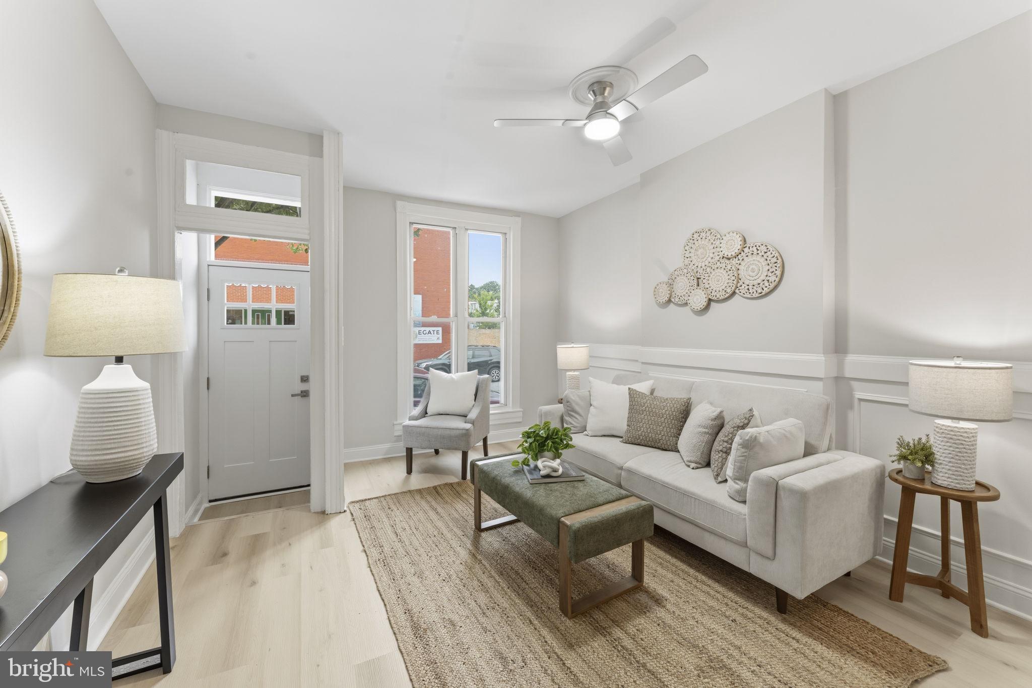 If you've been searching for the perfect blend of city living, neighborhood charm, and thoughtful updates, your search ends here.

Welcome to 3639 Chestnut Avenue, a beautifully renovated three-bedroom, one-and-a-half-bath rowhome in the heart of Hampden. Step inside to an open floor plan where the living room flows seamlessly into the dining area and kitchen, creating a space that's perfect for everyday living and entertaining. A custom picture-frame accent wall stretches the length of the main living space, adding character and a designer touch, while fresh paint, recessed lighting, updated fixtures, new hardware, and luxury vinyl plank flooring create a clean, modern feel throughout the first floor.

The kitchen offers solid wood cabinetry,  quartz countertops, stainless steel appliances, a pantry closet, and plenty of room for both a full-size dining table and casual eat-in seating, making it as functional as it is inviting.

Upstairs, the spacious primary bedroom features exposed brick, luxury vinyl plank flooring, and a generously sized closet, a rare find in many classic Hampden rowhomes. Two additional bedrooms feature brand-new carpeting, while two skylights bring beautiful natural light into the upper level. The refreshed full bath includes new flooring, a stylish vanity, fresh paint, and updated finishes.

The lower level offers exceptional flexibility with freshly painted floors, new recessed lighting, and abundant space for storage, a home gym, workshop, hobby space, or future finished living area. Step outside to enjoy the rear deck, the perfect spot for grilling, relaxing, or entertaining.

Recent improvements include a custom front door with a new frame and transom, a new basement window, refreshed exterior trim, fresh paint throughout, updated lighting and hardware, LVP flooring and countless finishing touches that make this home truly move-in ready.

The location is just as impressive. Walk to The Avenue's acclaimed restaurants, neighborhood cafés, breweries, boutiques, parks, and local favorites. Enjoy annual traditions like Miracle on 34th Street and HonFest, catch a movie at The Rotunda, or take advantage of quick access to I-83 and downtown Baltimore. Hampden is one of Baltimore's most walkable, creative, and vibrant neighborhoods, and this home places you right in the center of it all.

Move in, unpack, and start enjoying everything Hampden has to offer.