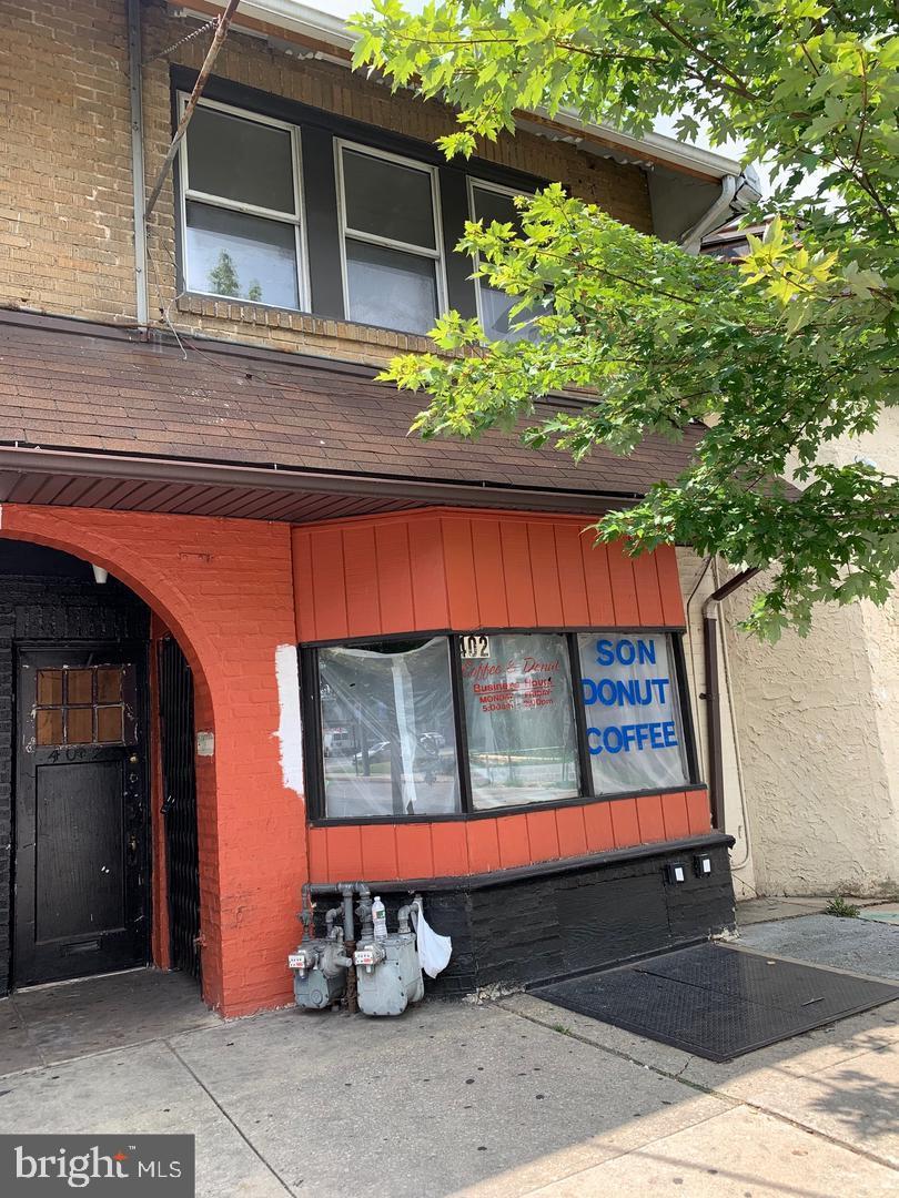 Don’t miss this fantastic opportunity to add a fully occupied, income-producing, mixed-use property to your portfolio! Located on the highly visible and bustling Long Lane commercial corridor in Upper Darby, this versatile two-unit building offers immediate cash flow and strong long-term potential.

With significant improvements made by the current owner since 2021, this property is a truly turnkey investment.

Investment Highlights:

Fully Occupied & Cash Flowing: Both units are currently tenant-occupied, providing immediate return on investment from day one.

Diversified Income Streams: Features one street-level commercial/retail unit and one upper-level residential apartment, insulating your investment across two rental markets.

Recent Capital Improvements: The property has been thoughtfully updated by the current owner since 2021, offering peace of mind and minimizing deferred maintenance for the next owner.

Excellent Visibility & Foot Traffic: Situated on a busy thoroughfare, the commercial unit benefits from excellent daily traffic counts, a large bay display window, and prime signage space.

Charming Architectural Details: Classic brick exterior, an inviting arched entryway, and a distinct facade give the building great curb appeal and character.

Property Breakdown:

Unit 1 (Commercial/Retail): Currently operating as a cafe/donut shop. Features a bright, expansive storefront window, an inviting separate entrance, and a versatile floor plan perfect for retail, food service, or professional office use.

Unit 2 (Residential): A private, second-floor apartment offering comfortable living space, great natural light from the large front windows, and its own dedicated entrance.

Whether you are a seasoned investor looking to expand your footprint in Delaware County or a first-time buyer seeking a reliable income property, 402 Long Lane delivers.