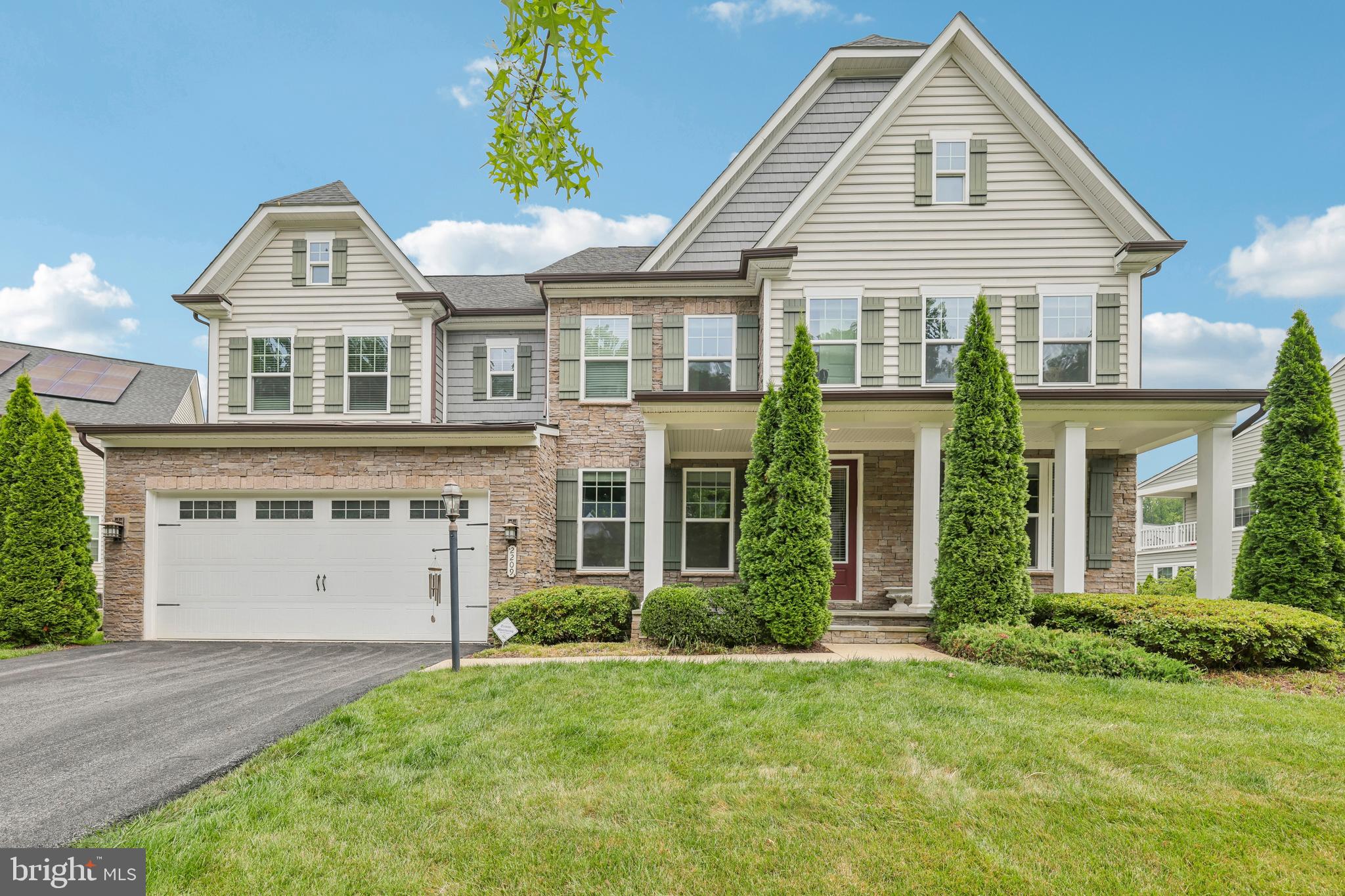 Welcome to this beautifully maintained, 8-year-young home in the sought-after Wilson's Grove community, offering 5 bedrooms, 4 full bathrooms, and 1 half bath. Designed for both everyday living and effortless entertaining, this home features hardwood flooring throughout the main level, 9-foot ceilings, and an open-concept layout centered around a spacious kitchen with a large center island, stainless steel appliances, a generous pantry, abundant cabinetry, and ample counter space.
The renovated formal living and dining rooms provide elegant spaces for hosting family and friends, while the finished lower level offers a spacious recreation room complete with a large bar area—perfect for entertaining, game nights, or relaxing.
Step outside to the inviting patio overlooking the professionally landscaped backyard, creating the ideal setting for outdoor gatherings or peaceful evenings at home.
Upstairs, the expansive primary suite serves as a private retreat with a luxurious en-suite bath. Two secondary bedrooms are connected by a convenient Jack-and-Jill bathroom, while the additional bedrooms and bathrooms provide exceptional flexibility for guests, a home office, hobbies, or additional living space.
Additional highlights include built-in ceiling speakers for surround sound, a lawn sprinkler system, and numerous thoughtful upgrades throughout.
Residents of Wilson's Grove enjoy exceptional resort-style amenities, including a clubhouse, fitness center, swimming pool, tennis and basketball courts, playgrounds, scenic walking trails, and a variety of community events and activities throughout the year. Ideally located near Route 3 and other major commuter routes, this home offers convenient access to shopping, dining, parks, and employment centers while providing the perfect blend of comfort, style, and convenience.