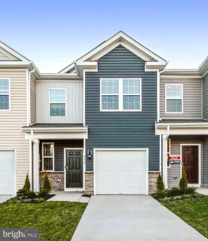 Enjoy modern maintenance free living in this newly built townhome on a premium lot backing to common area that is just moments away from the charm of downtown Winchester and Shenandoah University. This home boasts a stylish farmhouse façade and a well-designed interior that seamlessly blends functionality with aesthetics, offering the perfect blend of sophistication and comfort. The gourmet kitchen features stainless steel appliances, sleek granite countertops, a pantry, breakfast bar, and ample storage space. Upstairs, find three comfortable bedrooms with generous closets, luxury bathrooms with stylish fixtures, and a bedroom level laundry room. A one car garage completes this brand new home ready for move in. Enjoy the convenience of amenities and a sense of community in this carefully crafted environment. *Some photos shown are of the model home for furniture visuals.