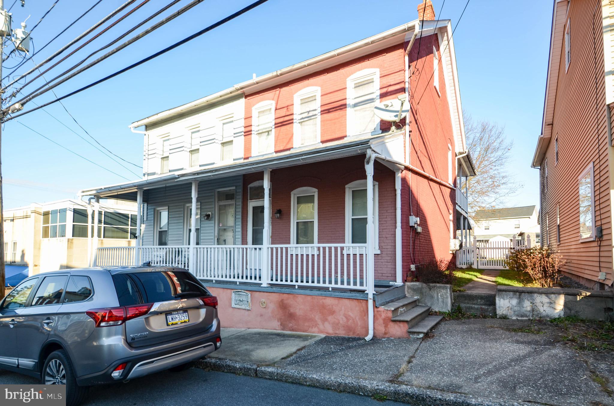 Welcome to this charming 3-bedroom twin home nestled in the heart of Emmaus Borough, walking distance to downtown. As you step through the front door, you'll be greeted by a spacious and inviting atmosphere. The large living room seamlessly flows into a combined dining area, creating an open and flexible space for entertaining or relaxing. The kitchen has been thoughtfully updated with granite countertops, a stylish glass tile backsplash, new cabinets and a center island, equipped with 4-5 seats. A convenient door leads to the side and back covered deck, where you can enjoy outdoor moments and overlook the fenced-in yard featuring an above-ground pool with a 3-year-old liner. Venturing upstairs, you'll find the master bedroom boasts its own upper covered porch, providing a private retreat. Additionally, there is a second and third walk-through bedroom, and a main bathroom is centrally located for easy access. The unfinished attic awaits your storage. The lower level houses the laundry area with a washer and dryer that are included. On the other side, you'll find the oil tank and furnace, and ample storage. This home also features a newer roof, 2-car off street parking, and a storage shed in the rear of the home. Prime location! Walking distance to local shops, entertainment, schools, parks and more. Property is being sold as is. Call today!