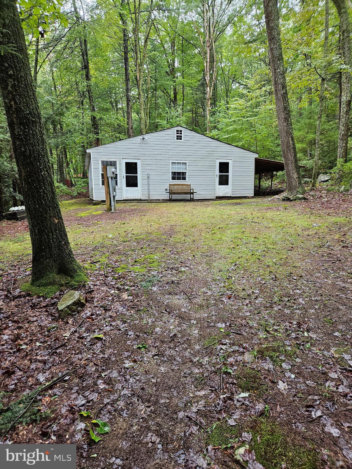 Calling all Hunters! This 2 bedroom recreational cabin is close to Bald Eagle State Forest and Reed's
Gap state park and an easy commute to Penn State events. The sunroom features numerous windows for
natural lighting and is a great area to eat a meal, play cards or just relax. No need to walk outside
to use a privy because the bathroom in the screened in porch has an incinerator toilet. The screen
porch opens to a covered patio where you can relax and enjoy the woods and wildlife. Seller installed new metal roof as well as 4 exterior doors.