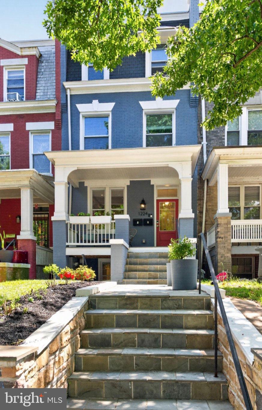 This exceptional painted-brick Federal residence, circa 1900, seamlessly blends timeless historic character with contemporary design in the heart of Columbia Heights. Spanning approximately 1,895 square feet, this three-bedroom condo lives like a single-family home and showcases high ceilings, oversized windows with abundant natural light, exposed brick walls, wide-plank oak hardwood flooring, designer lighting, and beautifully curated finishes throughout. Perched high on a quiet, tree-lined street, the home offers a rare balance of peaceful residential living while being moments from all conveniences.  The open-concept main level features a seamless flow between the living, dining, and kitchen areas - perfect for entertaining! The kitchen is complete with a double waterfall-edge quartz island, high-end Viking and Bosch stainless steel appliances, a six-burner Viking range with pot filler, oversized Viking refrigerator and freezer, Italian white gloss cabinetry, and a spacious pantry with sliding drawers. The main floor also offers a powder room and plenty of nooks for a work from home office. 

On the lower level you will find the primary suite with ensuite bathroom that includes dual vanity and spacious standing shower.  Two additional bedrooms with access to the updated hall full bathroom, laundry center and high ceilings.  The small two unit building was completely restructured in 2016 and additional highlights throughout the home include a built-in dual-zone Sonos audio system, security system, Ring doorbell and a user friendly honeywell thermastat system for the central heating/cooling.  The unit includes a private rear parking space accessed from the oversized alley. Outdoor spaces feature professionally landscaped grounds, a covered front porch, rear deck, private lower-level patio, and a storage shed. Perfectly positioned on one of Columbia Heights’ most sought-after streets, 1224 Euclid Street NW is just moments from the acclaimed restaurants, coffee shops, and nightlife along 14th Street and the nearby U Street Corridor. Everyday conveniences including Whole Foods Market and Trader Joe's are both within approximately a 10-minute walk. Low condo fee of $298/month which includes water, sewer, parking, and master insurance. Pet friendly! Open House next Saturday May 16th 1-3pm.