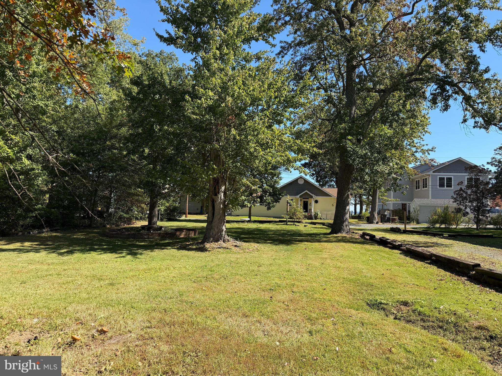 A rare blank canvas in one of the Bay's most beloved communities — build exactly what you've always imagined, right where you've always wanted to be.
Vacant land this close to the Chesapeake Bay doesn't come along often — and in the Holland Point subdivision of North Beach, Maryland, it is nearly impossible to find. This is your chance to stop dreaming and start building, on a parcel that puts the best of the Bay lifestyle within easy reach from the moment you arrive.
Envision a custom summertime retreat designed exactly to your taste — the floor plan you've sketched in your head, the porch you've always wanted, the garage or boat storage built right into the plan from day one. No compromises, no settling. Just the home you've always wanted, placed exactly where you want it.
When you're not on the water, stroll over to the Herrington Club for a long, leisurely lunch. Tend to your garden in the afternoon light. Launch your boat on a whim. Walk the waterfront at dusk. This is the lifestyle that 846 Walnut Avenue makes possible — and a parcel like this is the foundation on which it all begins.
The opportunities here are genuinely endless. Whether your vision is a weekend getaway, a forever home, or an investment in one of Maryland's most charming waterside communities, this lot delivers the location, the lifestyle, and the freedom to make it your own.
Don't wait — land this close to the bay, in a community this special, moves quickly. Your dream starts here.