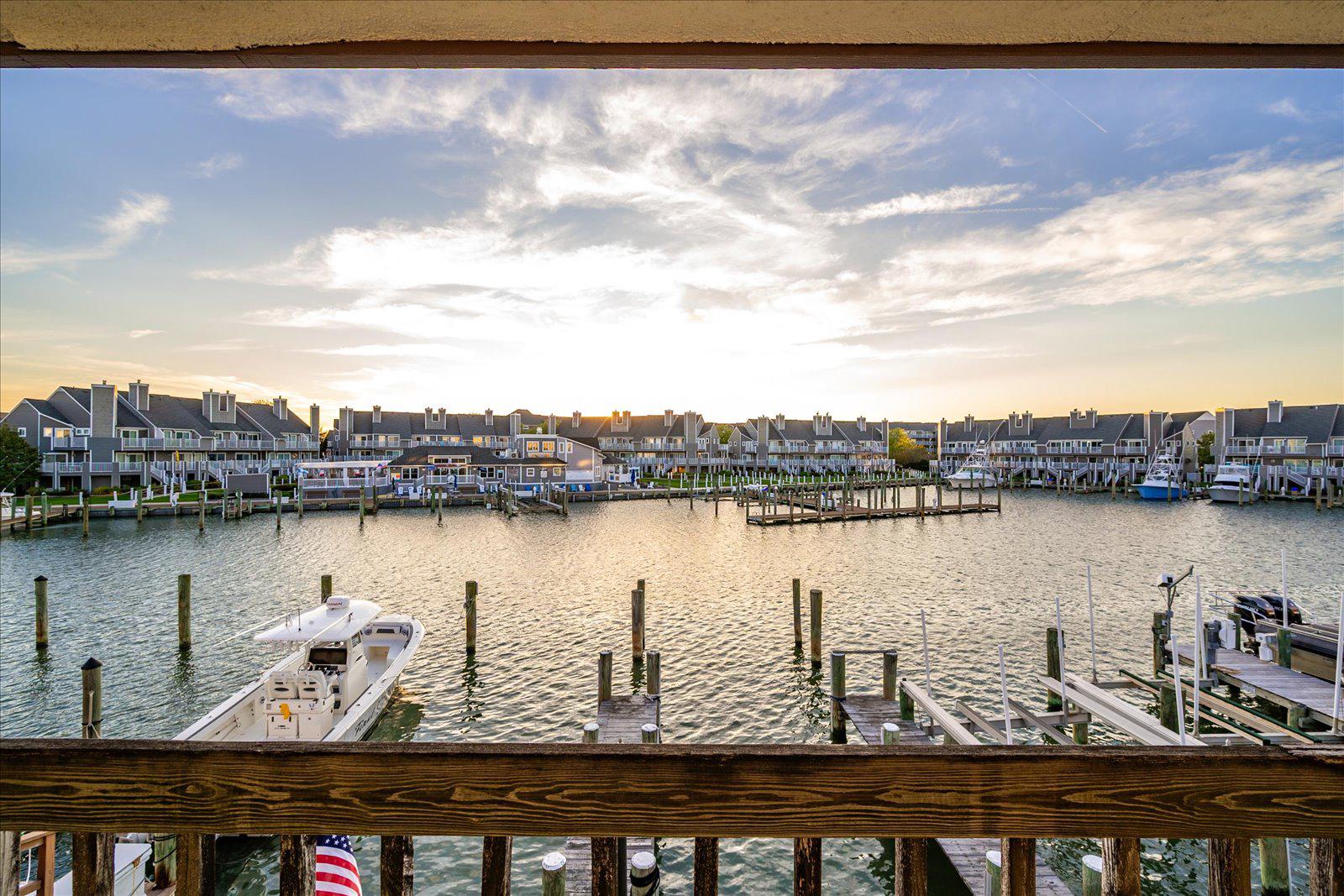 NEW PRICE! RARE WATERFRONT SINGLE FAMILY HOME WITH OPPORTUNITY  AND ENDLESS POTENTIAL! NEWER VINYL BULKHEAD! 
This is truly a one-of-a-kind waterfront property nestled on an oversized 6,000 sq ft lot overlooking the protected cove of Harbour Island. Opportunities like this are incredibly rare—offering not only location, but unmatched versatility and potential.
The existing over 2,000 sq ft two-story home invites you to bring your vision to life. Whether you choose to renovate and customize the current residence or explore the potential to build two units (with town approval)—living in one and renting the other—the possibilities here are exceptional.
Boating enthusiasts will appreciate the 3 private boat slips, including one with an electric lift, along with over 40 feet of water frontage complete with water and electric at the dock. Enjoy direct access to open water while being tucked into a calm, protected cove—perfect for boating, fishing, or simply relaxing by the water.
Enjoy gorgeous nightly sunsets while entertaining family and friends on your large private deck after a day on the water. Prefer the beach? You’re just a short walk away from putting your toes in the sand.
This location is truly a WATERMAN'S DREAM, offering endless opportunities for fishing, boating, swimming, and even front-row seats from your own deck to watch the excitement of the annual White Marlin Tournament, including the boats returning, weigh-ins, and all the energy this iconic event brings.
Skip the beach traffic altogether—just hop on your boat and cruise to the many waterfront restaurants and bars along the Ocean City bayfront for dining, drinks, and entertainment.
Why pay condo or HOA fees when you can own your very own piece of waterfront paradise? This property offers the freedom, space, and flexibility that’s hard to find in today’s market.
This home is being sold “As Is”, presenting a rare opportunity to secure a premier waterfront location and make it your own.
The world is your oyster with this Harbor Island gem—don’t miss an opportunity like this again!
