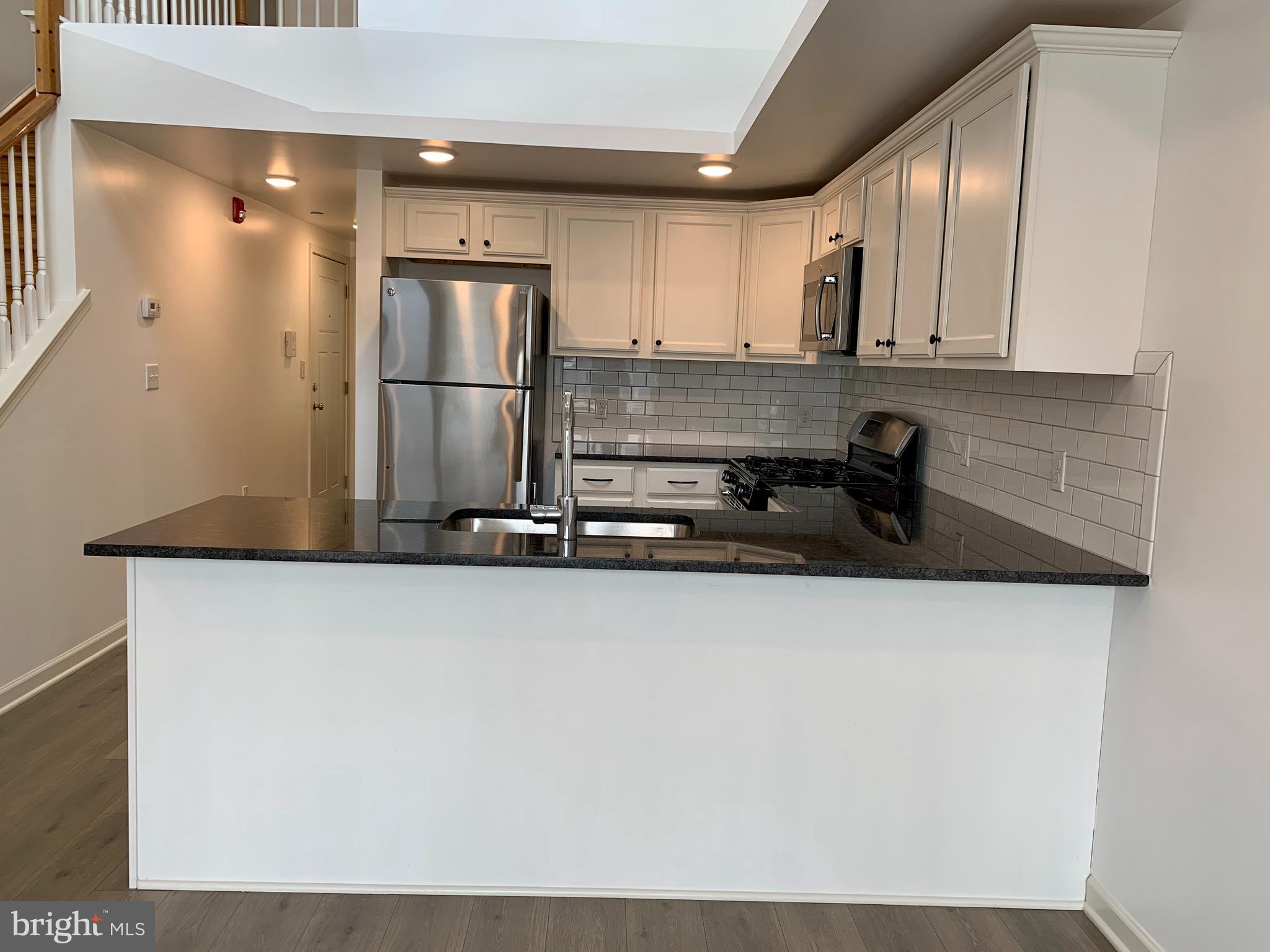 Available July 1st! Stunning and modern bi-level 2-bedroom 2-bath apartment home one block from the Ridge Avenue business corridor in Roxborough! Your new home features easy-to-clean wood laminate flooring, custom granite countertops, washer/dryer, and central AC/heating to keep you comfy year-round. Conveniently located close to shopping, dining, public transit, and more. Parking is available in the adjacent lot through ParkAmerica ($75/month). Easily pay rent and submit service requests with our online resident portal. Plus, we are pet friendly with NO FEES! This home will not last - so apply today!