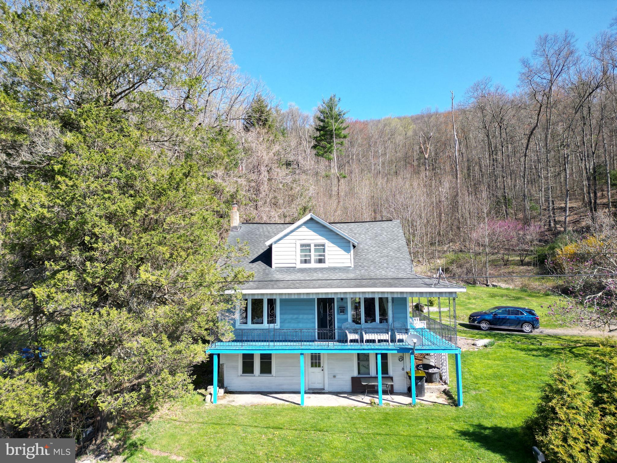 Country living on 1.5 Acres. New mini splits (5) provide heat and air. Modern kitchen and bath. Plenty of off-street parking plus room for a garage. Coal unit in the basement is in working order. Basement can refinished for additional living space. Gym etc. Minutes from off road 4x4 or ATV trails.