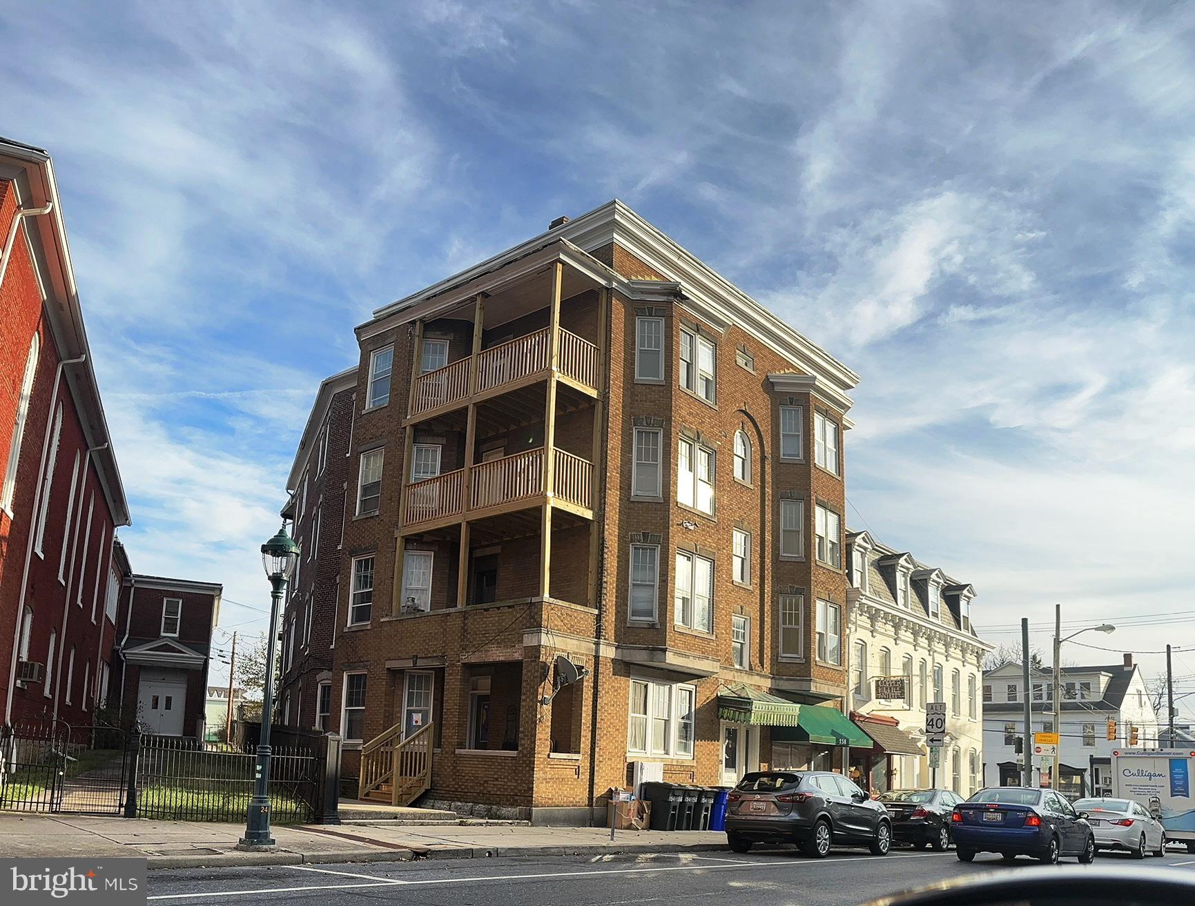 Rare Investment Opportunity – Solid Brick 10-Unit Building + Garage in Hagerstown’s Arts District

This is a prime opportunity to own a four-story, all-brick 10-unit apartment building with a freestanding 3-bay garage, located in the heart of Hagerstown’s Arts & Entertainment District.

Positioned on a 0.22-acre parcel totaling 9,745 sq ft, the building includes 12,736 sq ft of gross building area and features a mix of 9 residential units and 1 commercial unit, all with separate electric meters.

The site is zoned CC-MU (City Center – Mixed Use), offering long-term flexibility and value for investors. The building is fully leased and located just blocks from the new multi-use sports and events facility, University of Maryland Hagerstown campus, and the Washington County Library.

🔑 Highlights:

Fully occupied 10-unit building (9 residential / 1 commercial)

Separate utility metering for all units

Detached 3-bay garage on-site

Located within Hagerstown’s revitalization zone

High visibility and walkable to key downtown amenities



This property offers a stable rental income stream with future upside potential, a perfect fit for seasoned or new investors looking to grow their portfolio in a rapidly improving downtown market.

🏢 Unit Mix – 10-Unit Building

5 units – 3 bedrooms / 1 bathroom

3 units – 1 bedroom / 1 bathroom

1 unit – 2 bedrooms / 1 bathroom

1 commercial unit

Each unit is individually metered for electric, and the property includes a freestanding 3-bay garage for additional value or potential rental income.