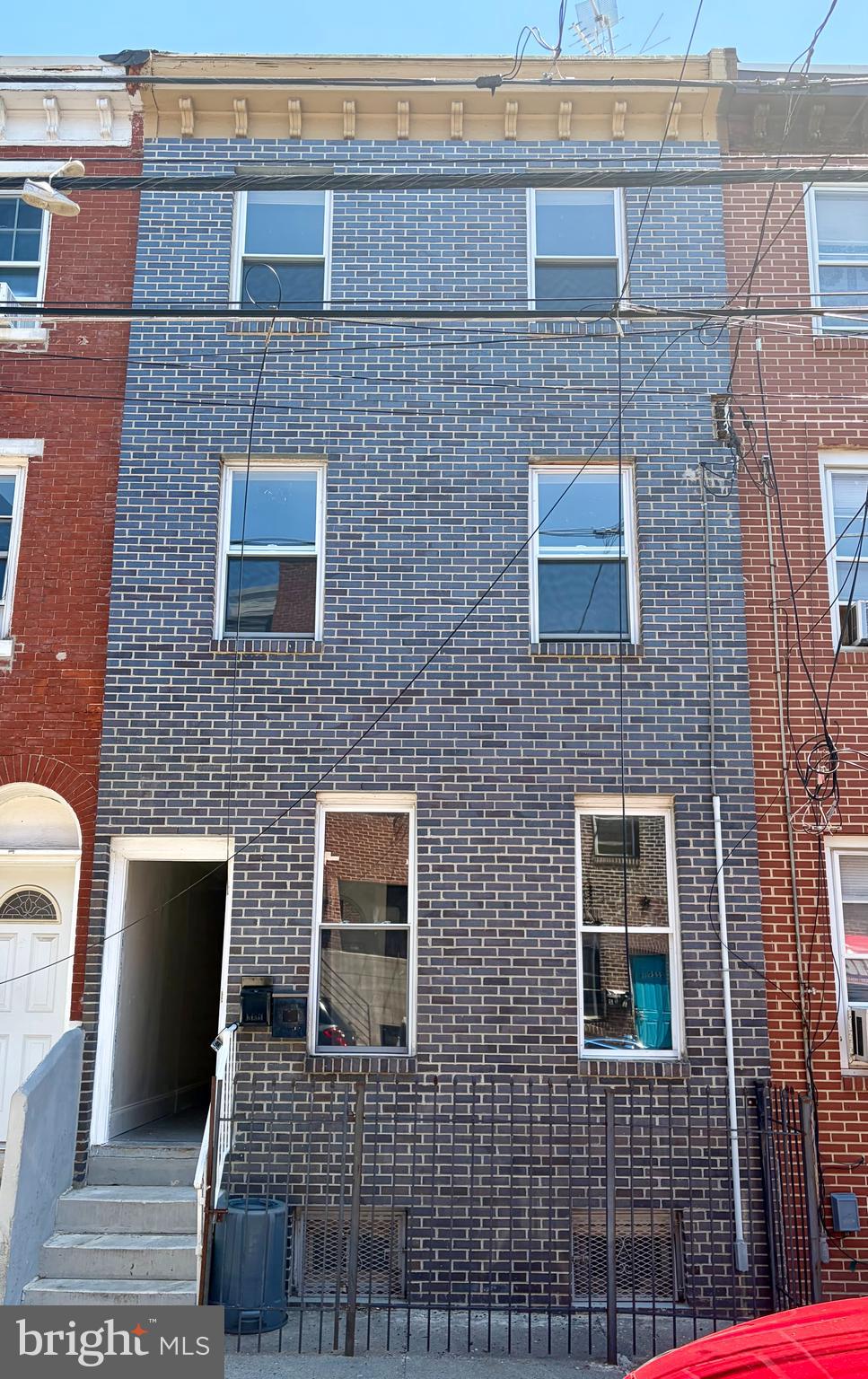 3 story row-home in Norris Square. Brand New brick front facade. Property is currently setup as 3 apartments. Zoning allows for apartments by right please consult with your zoning attorney. The current legal use however is residential single family. Seller is open to a zoning contingency if needed. Property is much larger than square footage in public records. Property was expanded to the total lot footprint. Therefore, there is no backyard. Schedule your tour today.