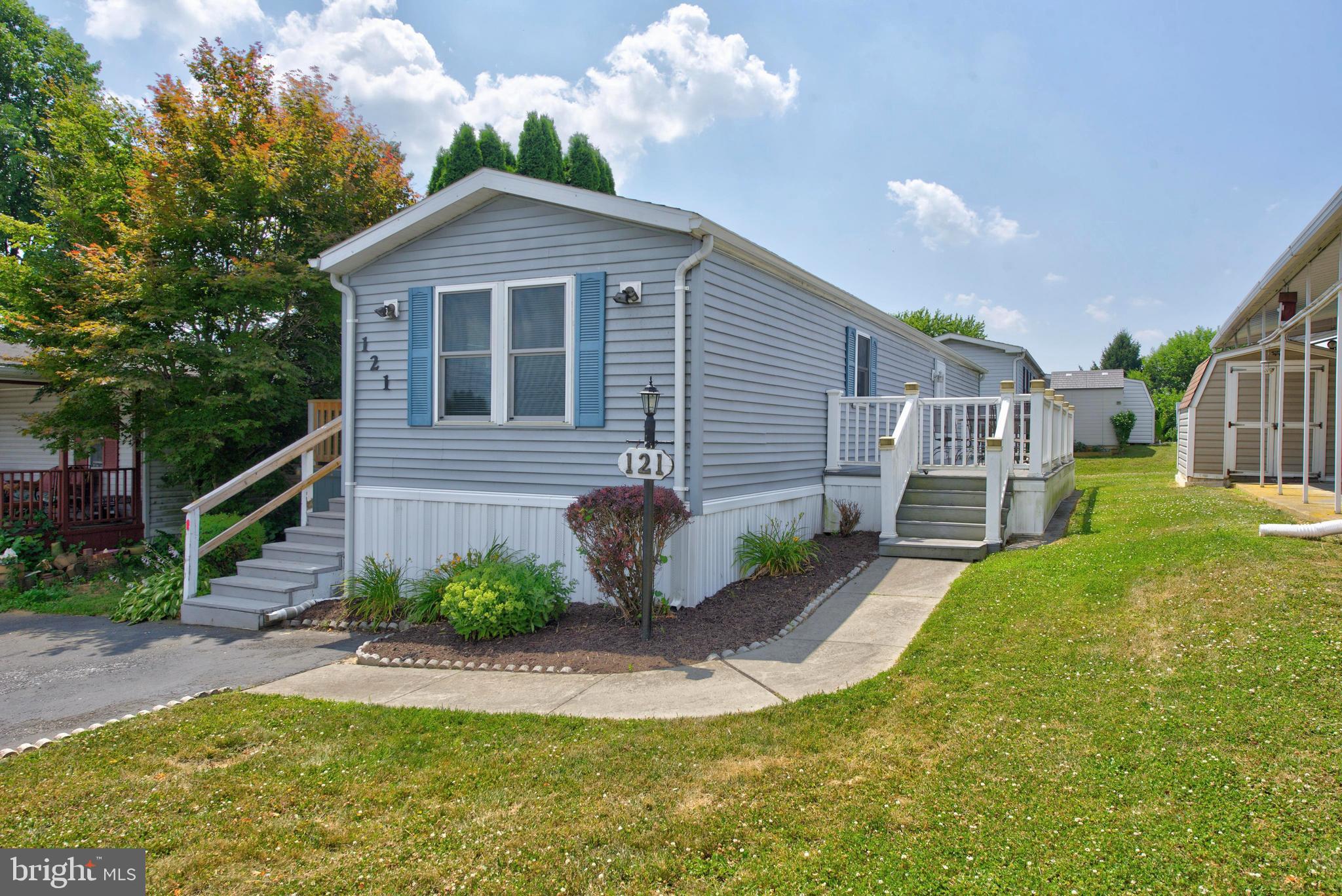 Welcome home.... to this two bedroom, one bath, well‑maintained manufactured home in Pheasant Ridge.  The home offers a clean, efficient layout with a long list of recent upgrades. Enjoy peace of mind with replacement windows (2024), HVAC (2023), gas heat and central air, water heater (2023), and a new washer (2026). The kitchen and laundry are fully equipped — all appliances are included. The home’s manageable size, private driveway, and low‑maintenance lifestyle make it an ideal option for anyone seeking affordability and convenience. Pheasant Ridge provides a welcoming community setting with easy access to shopping, dining, and major routes.  HOA fee includes: Lot Rent, Swimming Pool, Clubhouse, Playground, Fitness Center, Basketball Courts, and is a Pet Friendly community.  A move‑in ready home with mechanical updates already done — a great value in a convenient Lancaster location.