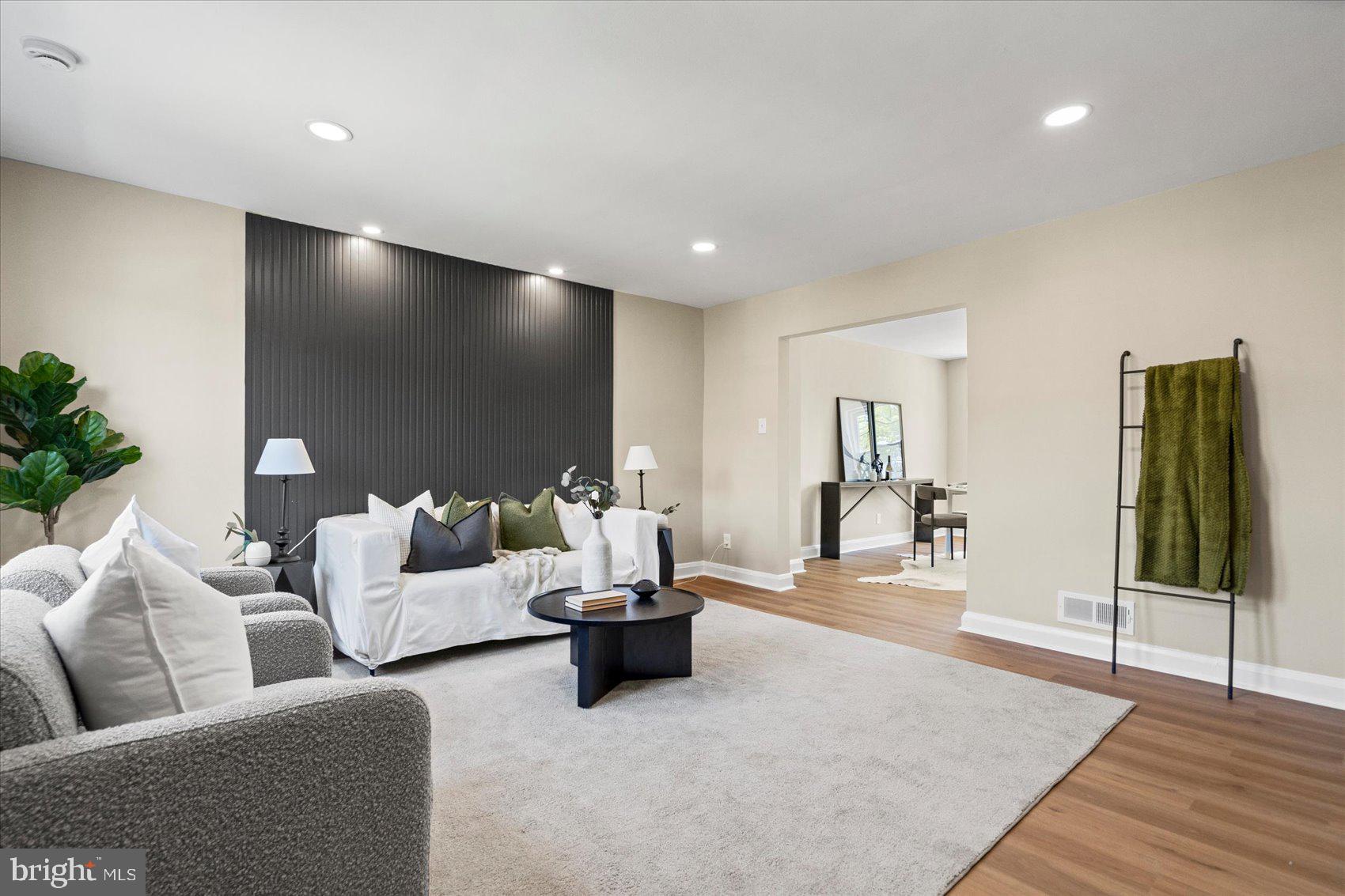 Welcome home to this fully renovated row house in the heart of Belair-Edison! This beautifully updated home offers the perfect blend of modern finishes and functional living space. The main level features a bright and inviting living room, a separate dining area, and a stylish updated kitchen. Upstairs, you'll find 3 spacious bedrooms and a full bathroom with contemporary finishes. The fully finished basement adds valuable additional living space and can easily serve as a family room, home office, gym, or even a potential fourth bedroom. There is also a 2nd full bathroom and a laundry room. Step outside to enjoy the large fenced-in rear yard. Move-in ready and waiting for its new owner!