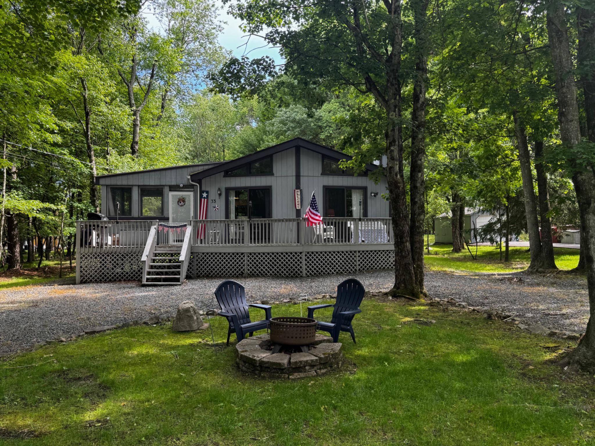 Discover this inviting prowl front ranch nestled in an established Pocono community. This charming home features three  bedrooms, two  bathrooms, and a bright, three-season enclosed porch—perfect for relaxing or entertaining in any weather. The front deck spans across the front of the home. Enjoy the ease of single-level living and take advantage of the home’s proximity to community amenities. The amenities include an in-ground pool, a lake with a beach for swimming and boating, a playground, and a marina area. There are tennis, pickleball, and basketball courts located in the Marina area of the community. A clubhouse with a restaurant and membership-required bar is located lakeside. A circular drive offers plenty of parking for the home. The level yard is ideal for outdoor activities. You enter the home and into the enclosed, generously sized sunroom with three walls of windows. The main living area is an open layout with a vaulted ceiling and two large sliders at the front of the home, allowing great visibility to the outdoors and natural light to flow in. The kitchen features a peninsula ideal for casual dining or serving to the dining area. Down the hall, there is a laundry and mechanical closet. A full bath with a tub/shower is located off the hall. At the left rear of the home is the primary bedroom with its own bath. The remaining two bedrooms are well-sized and receive good natural light. The home needs some minor TLC, a fresh coat of paint, and some interior trim, closet doors to get it to a finished state. The seller is in the process of replacing the flooring in the kitchen, hall, and dining room. The bedroom carpets were recently redone. Easy access from the PA Turnpike NE Extension at exit 87 makes it an easy commute to most anywhere in PA/NY/NJ.