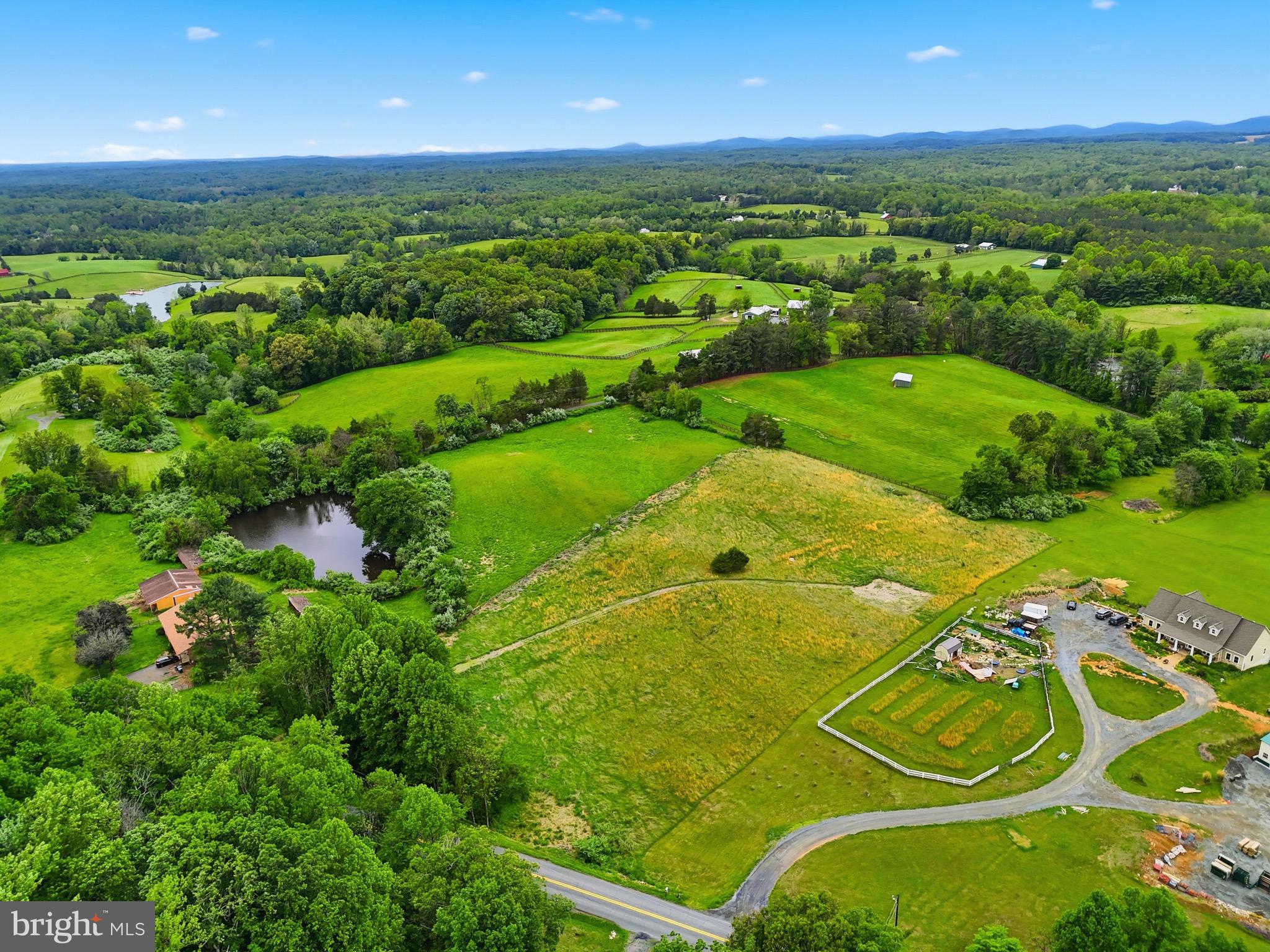 Discover a rare opportunity to build your dream home on a breathtaking nearly 5 acre lot in the heart of Northern Fauquier County, free from HOA restrictions. The property features an installed VDOT-approved driveway, approval for a conventional drain field for a 5-bedroom home, and a cleared, leveled homesite surrounded by natural landscape and mature screening for immediate privacy. Enjoy peaceful surroundings backed by conservation easements while remaining conveniently located between the historic towns of Warrenton and Marshall with easy access to fine dining, vineyards, shopping, and major commuter routes. Experience the opportunity to create your custom estate in the heart of Virginia horse country.

Whether you are ready to build with your own builder, interested in partnering with the current owner builder, or simply searching for the ideal homesite to hold for the future, this property offers exceptional flexibility and long term potential.

The expansive lot provides ample space for a custom estate home, outdoor living areas, recreational enjoyment, and more, all while maintaining a peaceful and private natural setting.

If you have been dreaming of building your own home, this property is also being offered as a to be built home opportunity. Please see MLS# VAFQ2022246 for additional details. You may choose from multiple available floor plans, starting at over 2000 square feet, each offering the opportunity for customization to fit your lifestyle, design preferences, and budget. Built by Water Creek Homes, a local Virginia builder.