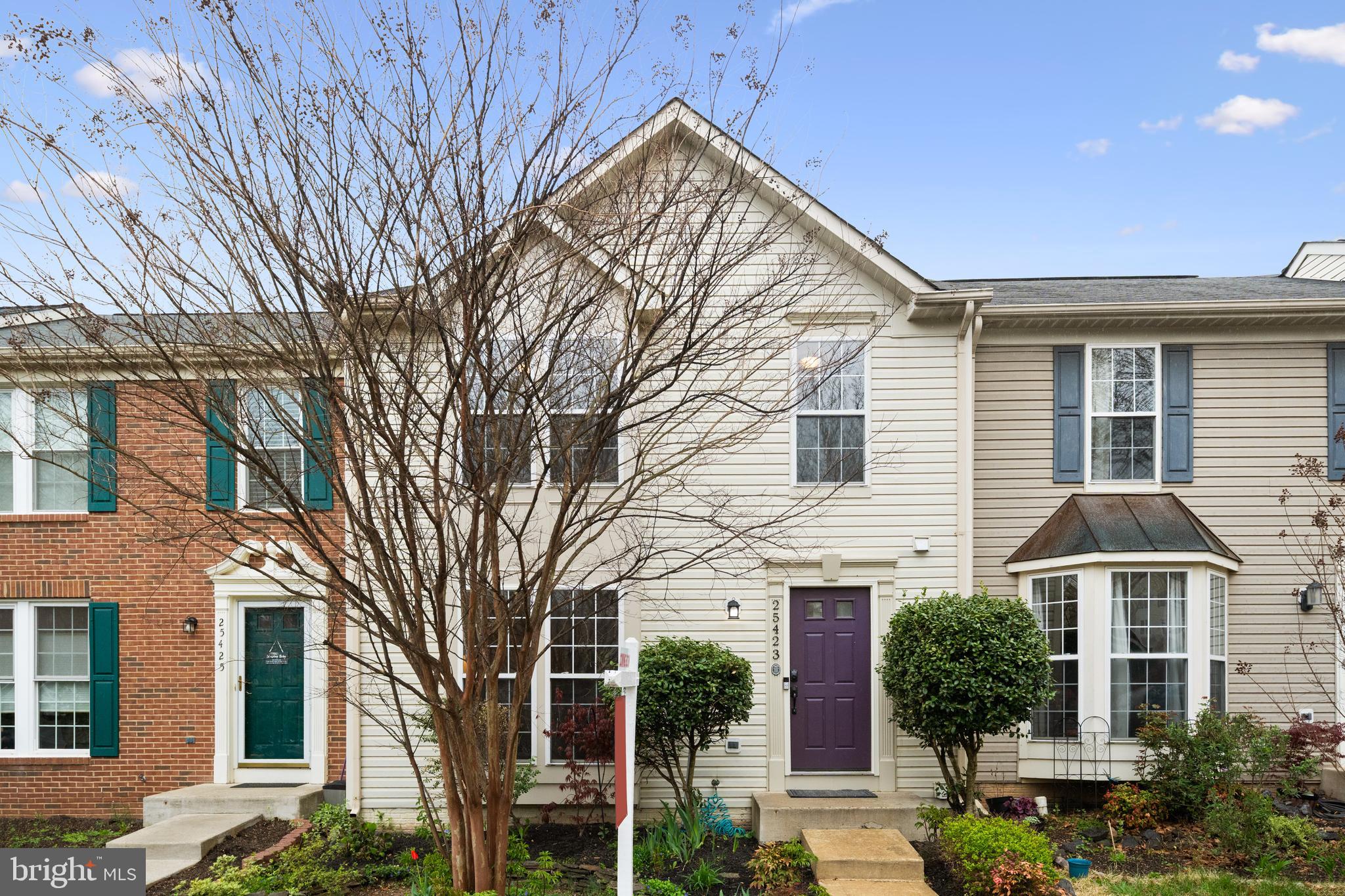 Nestled across the street from a community park, this well-maintained home offers three finished levels, including 3 bedrooms and 2 full baths that have been beautifully updated, plus a half bath on the main level. It also boasts gleaming hardwood floors throughout the main level and attractive, durable new luxury vinyl plank flooring on the upper and lower levels.

This stylish rear kitchen features white cabinets, a white subway tile backsplash, granite counters, and stainless steel appliances, with French doors that lead to a serene, fully screened-in deck. The lower level has a large rec room that walks out to a paver patio, which is covered by the screened porch above for additional weather-protected enjoyment. Hot water heater 2022-HVAC 2013

The vibrant community of South Riding is close to this lovely townhome—just three blocks from the Town Hall swimming pool and tennis courts, shopping, restaurants, and Starbucks.  Commute east? No problem. Less than a mile away is the convenient East Gate Park and Ride located on Tall Cedars Pkwy.  You don’t want to miss the chance to see this home!
