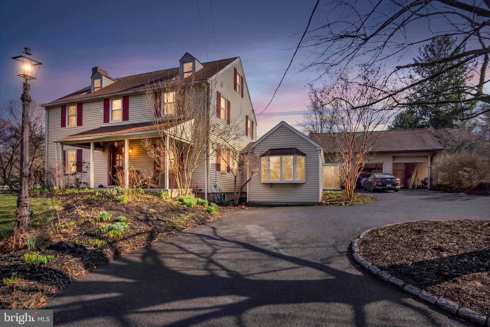 Nestled on a private, beautifully landscaped lot of nearly half an acre, this spacious 5+ bedroom home offers the perfect blend of charm, functionality, and exceptional value in highly sought-after Bryn Athyn Borough—featuring remarkably low combined taxes of under $3,800/year.
A circular driveway provides ample parking and leads to an oversized 2+ car garage with soaring ceilings—ideal for large vehicles, a workshop, or even a car lift. An attached bonus space offers incredible flexibility and potential—perfect for a studio, gym, home office, hobby area, or creative workspace tailored to your needs.
The inviting exterior showcases outstanding gardens, a welcoming front porch with serene views, and a brick patio perfect for outdoor dining and entertaining.
Inside, the home features both front and rear foyer entrances for added convenience. The main level boasts beautiful southern yellow pine floors, a spacious living room with a fireplace, a large formal dining room with access to the rear patio, and a bright family room off the kitchen with a vaulted ceiling and bay window. A well-appointed kitchen area includes generous counter space and a nearby powder room. A private first-floor office adds versatility for today’s lifestyle.
The second floor offers three bedrooms, including a primary suite with a walk-in closet and a spa-like en suite bath featuring a large tiled shower with glass enclosure and a soaking tub. Two additional bedrooms and a full hall bath complete this level.
The third floor provides two more generously sized bedrooms and a full tiled bathroom, along with abundant storage in the eaves.
Ideally located just minutes from the quaint shops and restaurants of Huntingdon Valley, this exceptional property offers both privacy and convenience. Don’t wait to schedule your showing—homes like this are rare and won’t last long!