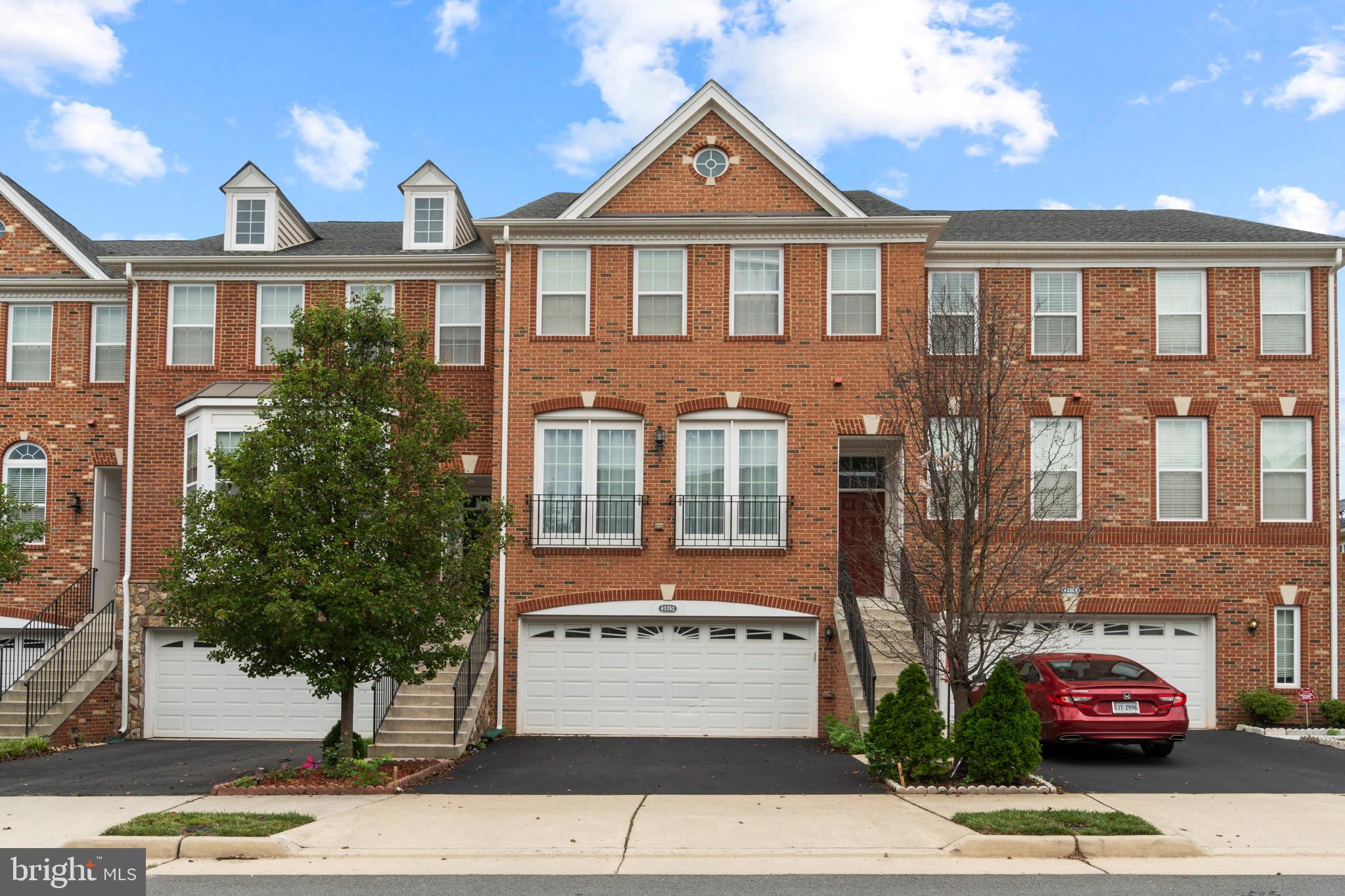 Beautiful 3 level townhouse available for rent in sought after Loudoun Valley Estates community. Over 2,700 square feet with bump out extensions on all 3 levels this home is loaded with upgrades throughout. The main level features elegant formal living and dining rooms, a gourmet kitchen with a large island that opens to the cozy family room and overlooks the sunny and bright morning room with a gas fireplace. The upper level features the huge primary bedroom suite with sitting room, primary luxury bathroom with dual vanities, separate soaking tub and stall shower, 2 separate walk-in closets, 2 additional spacious bedrooms with their own shared full bathroom. The lower level features a large rec room that's ready with 5.1 channel home theatre pre-wiring, full bathroom and access to the oversized 2 car garage with EV charging installed. Walk out to your very own private backyard with a stone patio and oversized trex deck. Ample visitor parking nearby. Enjoy the many amenities of Loudoun Valley Estates including outdoor pools, sports courts, clubhouse, fitness center, tot lots/playgrounds, nature trails, etc. Location Location Location! Great commuter location, this home is near Routes 50, 28 & 7, the Dulles Greenway, Dulles Airport and Ashburn's future Silver Line Metro station. Conveniently located close to Brambleton Town Center, One Loudoun, Dulles Town Center. Great schools!!