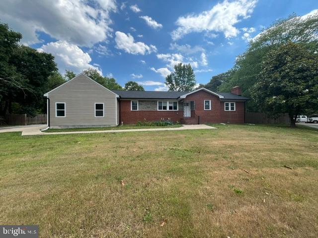 Rambler style home with 3 bedrooms 3 bath. 2 Car garage Basement . This home LOCATED ON LARGE 0.89 SQ FT LOT.  Seller is The Secretary of Veterans Affairs.  Some visable discoloration has been cut and removed from property.
