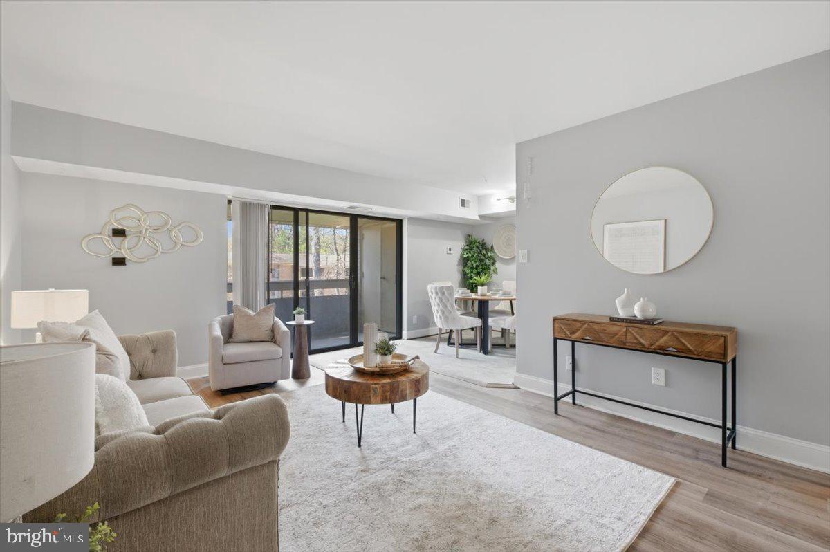 Welcome to this beautifully updated 3-bedroom condo in Glenvale Condos, part of the Reston Association. Offering over 1,000 square feet of thoughtfully designed living space, this home combines modern upgrades with unbeatable convenience.

Completely refreshed in 2024, the kitchen shines with sleek quartz countertops, updated white cabinetry, stylish new hardware, and a modern backsplash. The upgrades continue throughout the home with all-new light fixtures, faucets, and hardware, along with durable vinyl flooring in the living room and hallway. An electric mounted fireplace adds a cozy, contemporary touch, while a Ring camera provides added peace of mind.

The home features one full bathroom, along with a private ensuite sink and vanity area in the primary bedroom for added functionality and comfort.

Residents of the Reston Association enjoy an exceptional lifestyle with access to multiple swimming pools, sports courts, scenic walking and biking trails, community centers, and year-round events.

Ideally located just minutes from Reston Town Center, you’ll have easy access to premier shopping, dining, and entertainment. Commuters will appreciate the proximity to Metro service, bus routes, major highways, and Dulles International Airport.