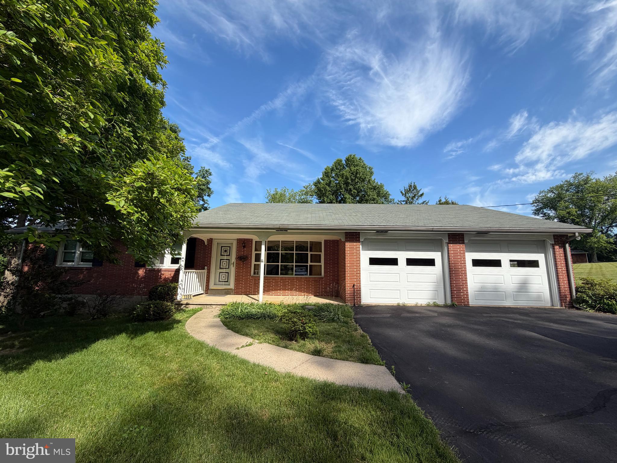 This ​well built 3-bedroom 2 car garage ranch home offers comfortable one​ floor living on a spacious lot of nearly one acre. The main level features a large eat-in kitchen​ with plenty of cabinets and counter space, a bright living room with a beautiful bay window, and three generously sized bedrooms, including one with a cedar closet. A large tiled bathroom​, hardwood flooring ​and plenty of closet space add to the home's appeal.​ A heated mudroom​ that connects to the side porch and garage provides​ a half bath and flexible space that could easily serve as a den, home office, or hobby room.   The heated basement includes multiple rooms​ providing excellent potential for additional living space, recreation, workshop or storage​ and awaits finishing touches.​ Enjoy relaxing on the covered front ​or side porch.   An oversized two-car garage offers abundant space including convenient overhead storage and ​ complete this home.​ Additional features include replacement windows, a newer hot water heater​ and roof replacement in 2018. ​Property is located with easy access to Rt 100 and is a quick drive to grocery stores, banks, restaurants and more. Don't miss this opportunity to own a solid all-brick home with great space and flexibility located in the desirable Boyertown School District!