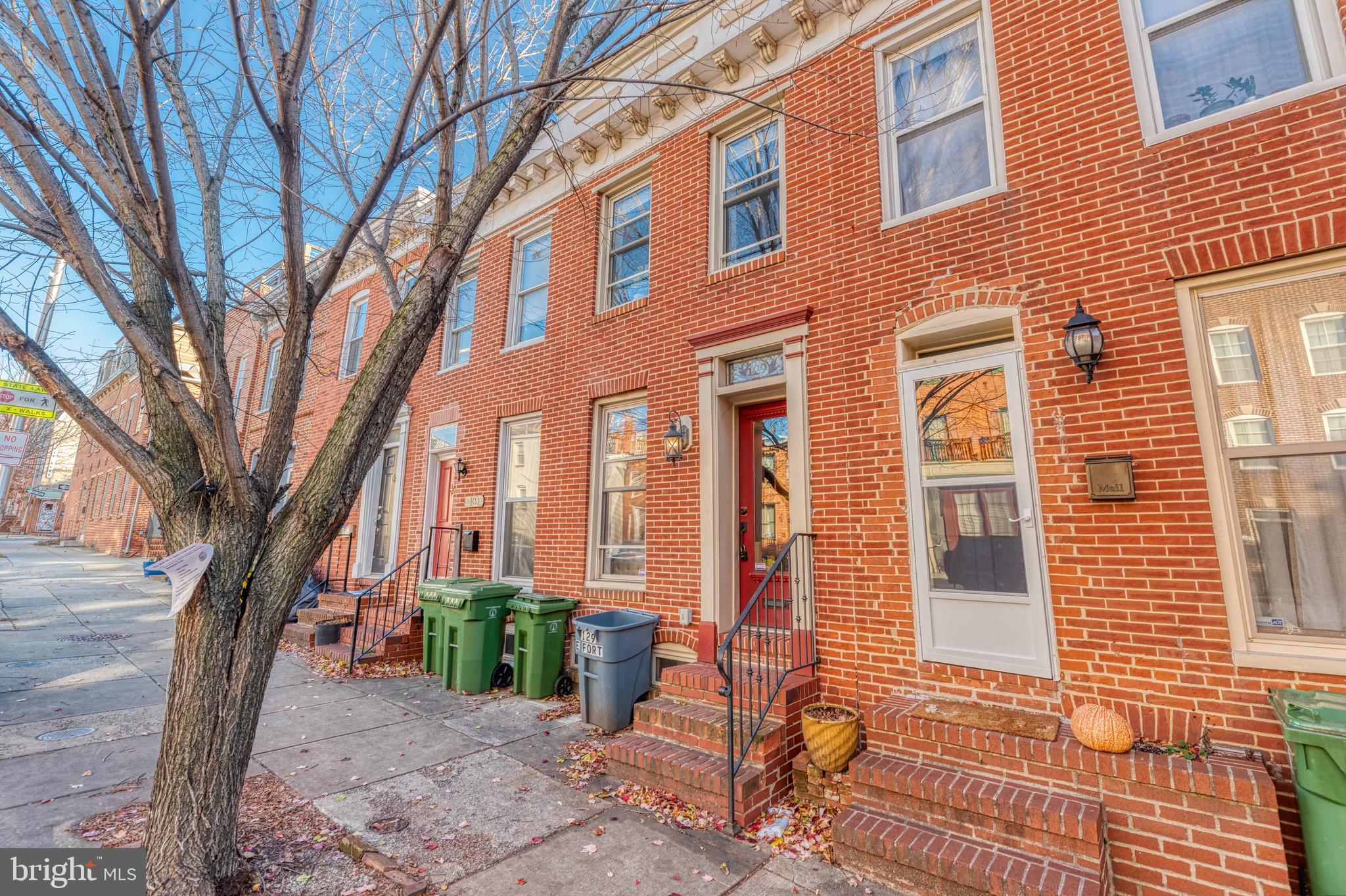 Well maintained newer renovation with 2 suites & luxurious updates throughout. Perfect for roommates! The open first floor features hardwood floors, cherry cabinets, granite countertops and stainless steel appliances. Enjoy a separate wine bar, breakfast bar with separate living room and dining room. The first floor also features full size laundry and powder room in the rear which leads to the private deck. The basement is finished which is great for another living room, office, or guest space. The basement also has a utility room with high efficiency furnace, sump pump, and water heater. The upper level features two separate suites both with high end bathrooms and access to a rooftop deck. Incredibly well maintained by previous and current owners. Conveniently located between Federal Hill Park and Riverside Park. Stadiums, shopping, restaurants and bars, and public transport are all just a short walk away.