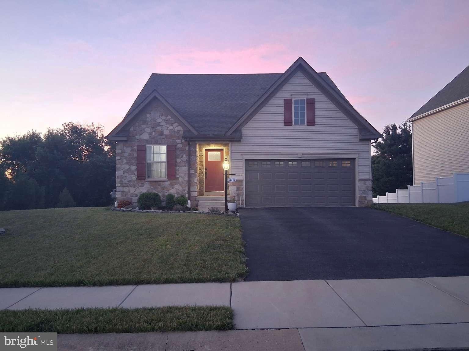 Welcome to this beautifully maintained, move-in-ready 2022-built home in the desirable Rolling Meadows community of Manchester, Pennsylvania. Offering approximately 1,950 square feet of thoughtfully designed living space, this 3-bedroom, 2.5-bath home combines the convenience of first-floor living with the benefits of newer construction.
The main level features an open and functional floor plan designed for both everyday living and entertaining. The kitchen, dining area, and living space flow together seamlessly, creating a comfortable and inviting gathering area. The kitchen features a center island, ample cabinet and counter space, and a layout that keeps family and guests connected.

A dedicated first-floor office with glass French doors provides an ideal space for working from home, studying, reading, or managing daily activities while maintaining privacy from the main living areas.

One of the home's standout features is the bright sunroom, accessed through elegant glass French doors. Surrounded by windows, the sunroom offers peaceful views of the open field and tree line behind the property. Enjoy the changing seasons and frequent visits from deer and rabbits while relaxing in this light-filled space.

The first-floor primary suite serves as a comfortable private retreat. The spacious en-suite bathroom features dual-sink vanities, a large glass-enclosed walk-in shower with built-in bench seating, and a separate private toilet room. Generous closet space and the convenience of main-level living make this suite a highlight of the home.

A first-floor laundry room adds further convenience and contributes to the ease of one-level daily living.

Upstairs, two additional bedrooms and a full bathroom provide comfortable accommodations for family members, guests, or flexible living arrangements.

The unfinished walk-out basement offers abundant storage space and future possibilities. A door from the basement provides direct access to the rear of the property.

Additional features include luxury vinyl plank flooring, central air conditioning, public water and sewer service, modern systems, and an attached two-car garage. Included appliances feature an LG French-door refrigerator with water and ice dispenser and dual freezer drawers, as well as a Samsung washer and dryer. Furnishings are negotiable.

Situated on approximately 0.25 acres, the property enjoys a scenic setting with open space, field views, and a tree-lined backdrop behind the home.

Residents of Rolling Meadows enjoy community amenities that include a swimming pool, pool house, basketball court, and playground. Conveniently located near Route 30 and I-83, the community provides easy access to York, Harrisburg, major employers, shopping, dining, entertainment, healthcare facilities, and a variety of recreational opportunities.

Property Highlights Built in 2022 Approximately 1,950 square feet Approximately 0.25-acre lot 3 bedrooms, 2.5 bathrooms First-floor primary suite Primary bath with dual vanities Glass-enclosed walk-in shower with built-in bench seating Separate private toilet room First-floor office with glass French doors Sunroom with glass French doors Scenic field and tree-line views Kitchen with center island LG French-door refrigerator with water and ice dispenser Samsung washer and dryer Luxury vinyl plank flooring First-floor laundry room Unfinished walk-out basement Attached 2-car garage Public water and sewer Central air conditioning Community amenities include a swimming pool, pool house, basketball court, and playground Convenient access to Route 30, I-83, York, and Harrisburg

This well-maintained home offers modern construction, desirable community amenities, and a peaceful setting in one of Manchester's popular newer neighborhoods. Move in and begin enjoying the comfort, convenience, and scenic views this exceptional property has to offer.