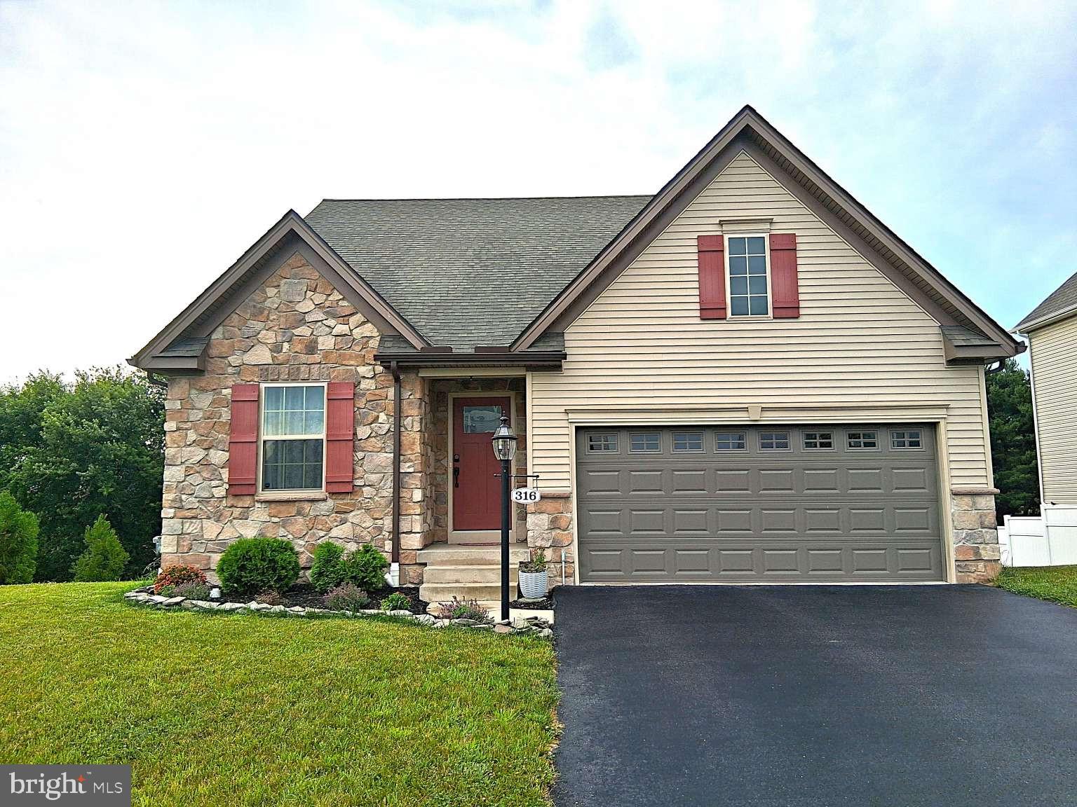 Welcome to this beautifully maintained, move-in-ready 2022-built home in the desirable Rolling Meadows community of Manchester, Pennsylvania. Offering approximately 1,950 square feet of thoughtfully designed living space, this 3-bedroom, 2.5-bath home combines the convenience of first-floor living with the benefits of newer construction.
The main level features an open and functional floor plan designed for both everyday living and entertaining. The kitchen, dining area, and living space flow together seamlessly, creating a comfortable and inviting gathering area. The kitchen features a center island, ample cabinet and counter space, and a layout that keeps family and guests connected.

A dedicated first-floor office with glass French doors provides an ideal space for working from home, studying, reading, or managing daily activities while maintaining privacy from the main living areas.

One of the home's standout features is the bright sunroom, accessed through elegant glass French doors. Surrounded by windows, the sunroom offers peaceful views of the open field and tree line behind the property. Enjoy the changing seasons and frequent visits from deer and rabbits while relaxing in this light-filled space.

The first-floor primary suite serves as a comfortable private retreat. The spacious en-suite bathroom features dual-sink vanities, a large glass-enclosed walk-in shower with built-in bench seating, and a separate private toilet room. Generous closet space and the convenience of main-level living make this suite a highlight of the home.

A first-floor laundry room adds further convenience and contributes to the ease of one-level daily living.

Upstairs, two additional bedrooms and a full bathroom provide comfortable accommodations for family members, guests, or flexible living arrangements.

The unfinished walk-out basement offers abundant storage space and future possibilities. A door from the basement provides direct access to the rear of the property.

Additional features include luxury vinyl plank flooring, central air conditioning, public water and sewer service, modern systems, and an attached two-car garage. Included appliances feature an LG French-door refrigerator with water and ice dispenser and dual freezer drawers, as well as a Samsung washer and dryer. Furnishings are negotiable.

Situated on approximately 0.25 acres, the property enjoys a scenic setting with open space, field views, and a tree-lined backdrop behind the home.

Residents of Rolling Meadows enjoy community amenities that include a swimming pool, pool house, basketball court, and playground. Conveniently located near Route 30 and I-83, the community provides easy access to York, Harrisburg, major employers, shopping, dining, entertainment, healthcare facilities, and a variety of recreational opportunities.

Property Highlights Built in 2022 Approximately 1,950 square feet Approximately 0.25-acre lot 3 bedrooms, 2.5 bathrooms First-floor primary suite Primary bath with dual vanities Glass-enclosed walk-in shower with built-in bench seating Separate private toilet room First-floor office with glass French doors Sunroom with glass French doors Scenic field and tree-line views Kitchen with center island LG French-door refrigerator with water and ice dispenser Samsung washer and dryer Luxury vinyl plank flooring First-floor laundry room Unfinished walk-out basement Attached 2-car garage Public water and sewer Central air conditioning Community amenities include a swimming pool, pool house, basketball court, and playground Convenient access to Route 30, I-83, York, and Harrisburg

This well-maintained home offers modern construction, desirable community amenities, and a peaceful setting in one of Manchester's popular newer neighborhoods. Move in and begin enjoying the comfort, convenience, and scenic views this exceptional property has to offer.