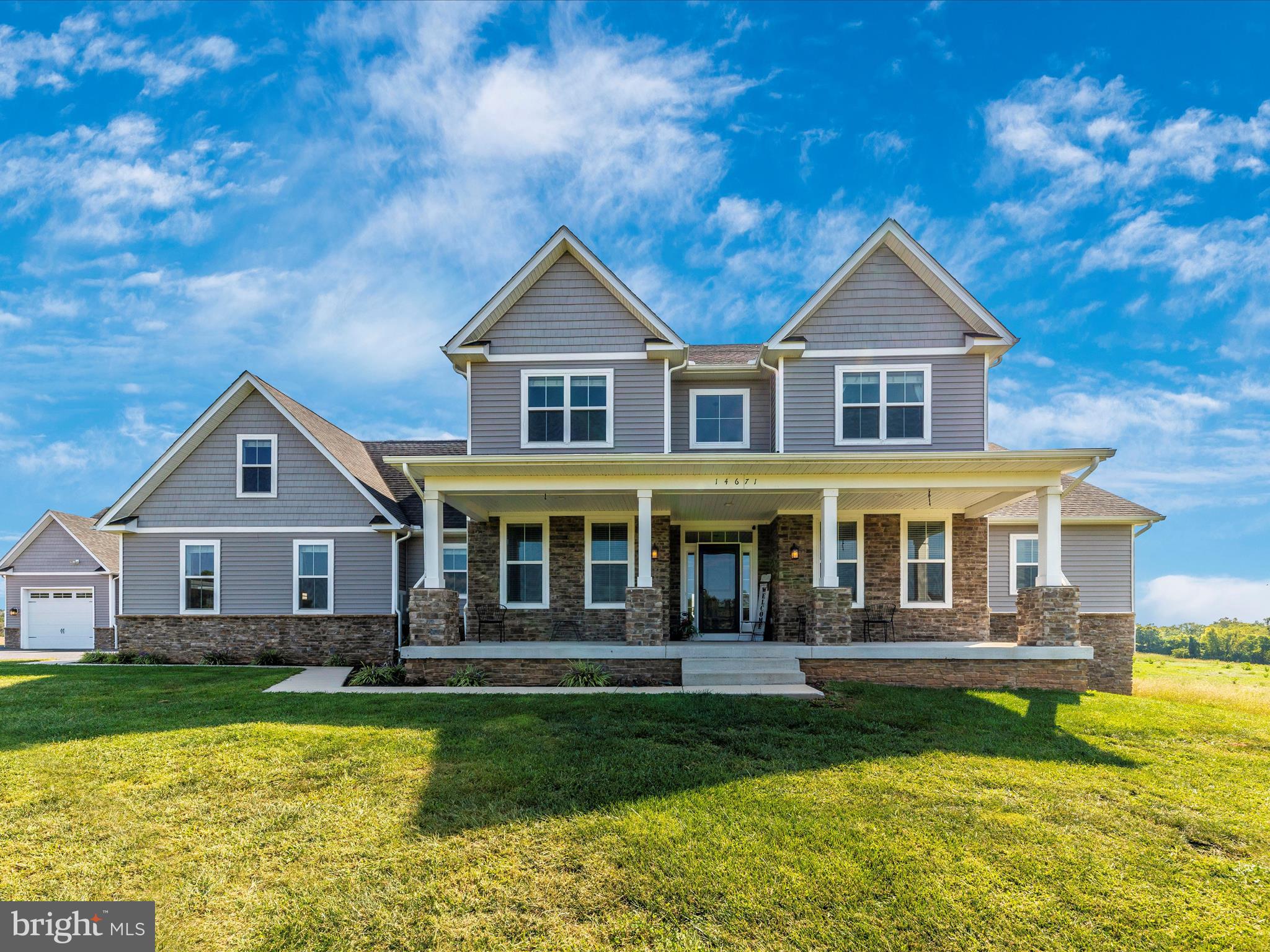 Why settle for new when you can own this exquisite custom-built 2019 home? Enjoy the freedom of NO HOA and the tranquility of being surrounded by farmland preserved under agricultural conservation. The farm backs to River Rd which makes travel to commuter routes super easy. This exceptional residence boasts two Main Level Primary Suites, with brand new carpet installed & each with its own luxurious bathroom. The Main Level features a spacious open floor plan, including a private office, a gourmet kitchen featuring stainless steel appliances, breakfast bar and recessed lighting, that opens to the family room with a striking double-sided fireplace.  Upstairs, you’ll discover two generously sized secondary bedrooms with en-suite bathrooms, a large loft area, a bonus room above the garage, and a convenient laundry chute.  For those who love outdoor living, the backyard is a true retreat. Relax by the pool with a sun shelf, or unwind on the Trex deck with custom gas fireplace under the pergola. The fenced yard also leads to a remarkable 48 X 30 detached garage, equipped with its own HVAC unit, TV, epoxy flooring, and an indoor basketball court. Plus, it even includes a bathroom—making it an ideal space for both leisure and utility.  This home is truly a must-see to fully appreciate its unique features and exceptional quality.